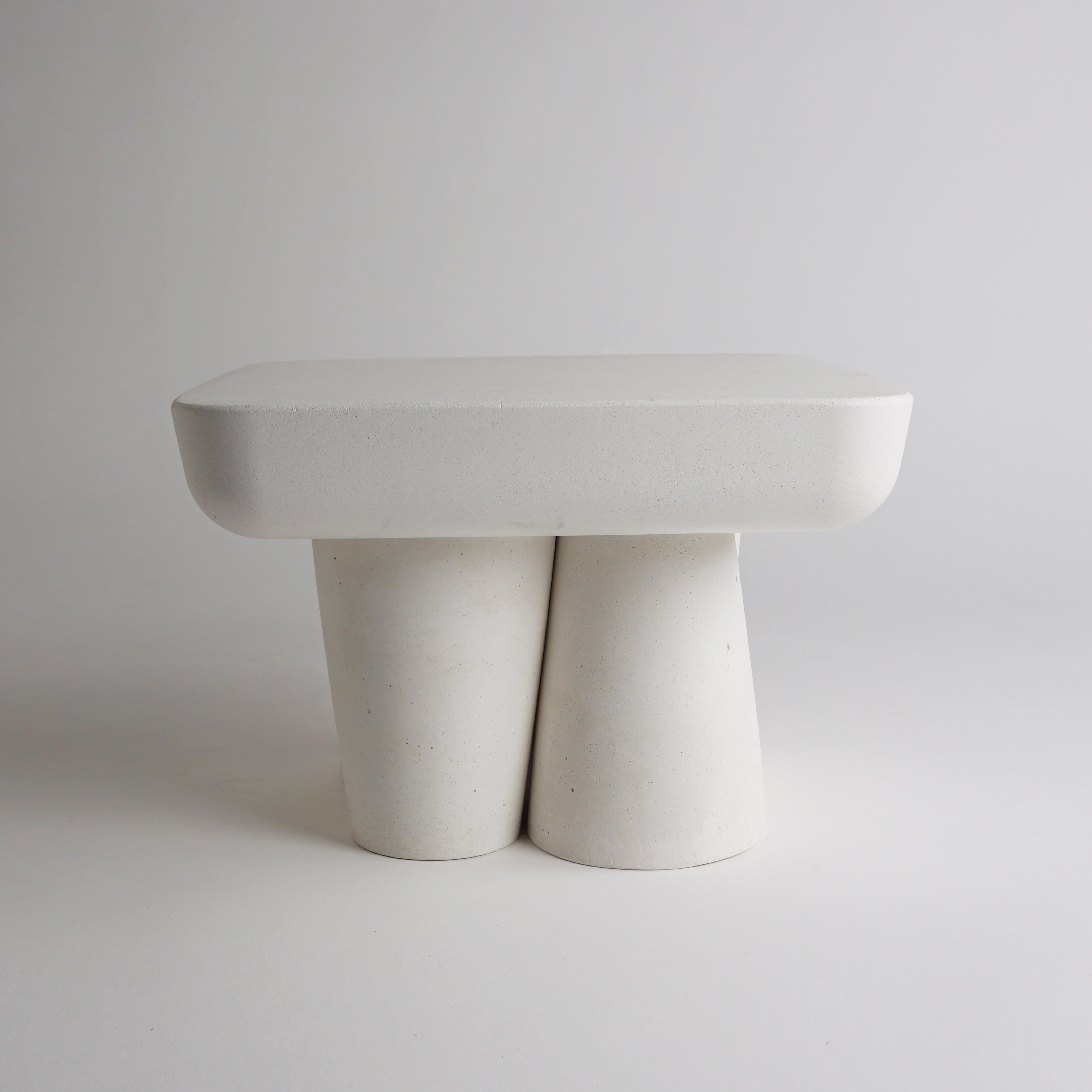 European 21st century contemporary modern sculptural marble, stone, concrete centerpiece stand 'Homme' in white by ALENTES.

Homme
Sculptural Display Stand
The simple yet different facades of this stand bring a sophisticated tone to any setting.
