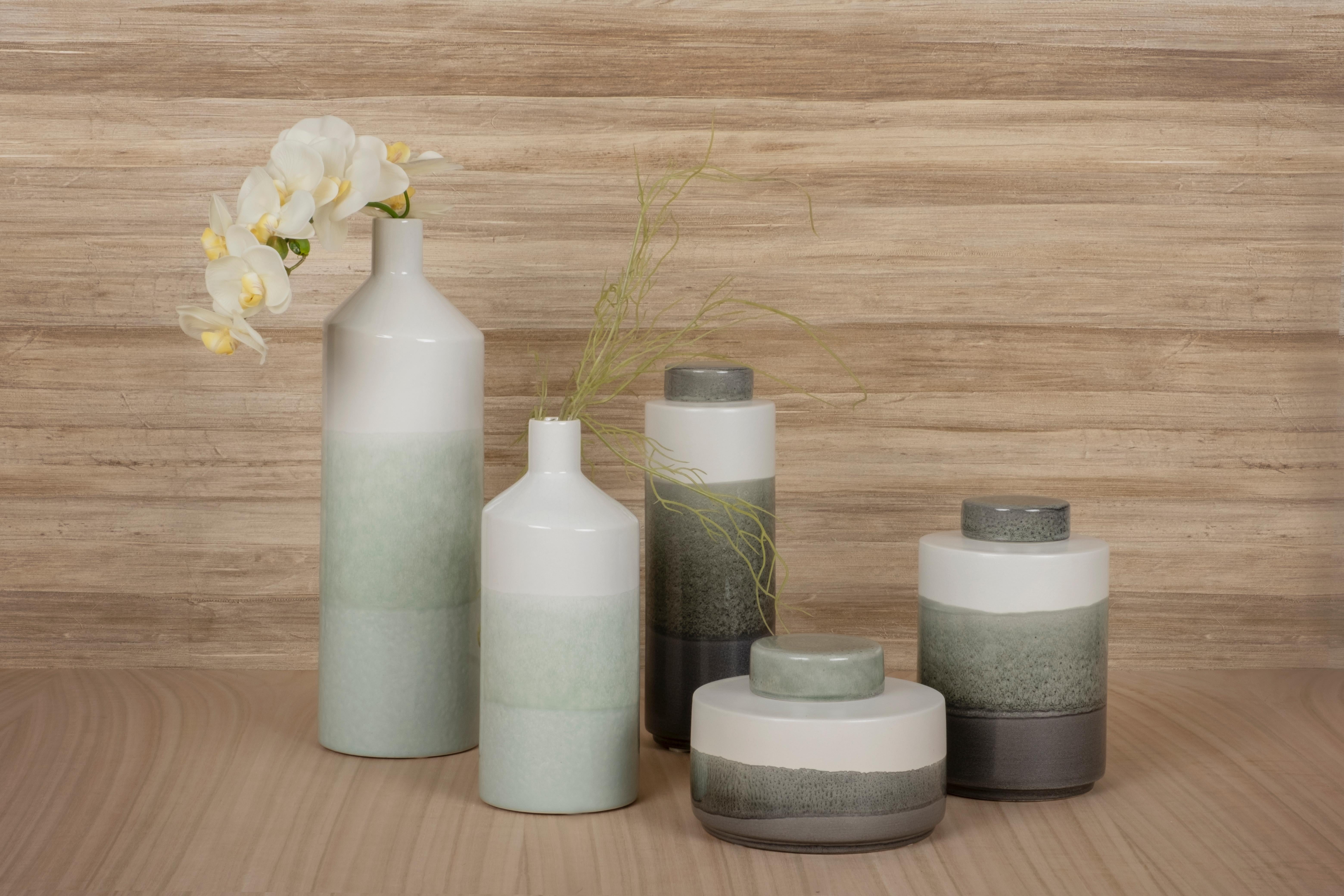 Graham pots, Lusitanus Home Collection, handcrafted in Portugal - Europe by Lusitanus Home.

This beautiful set includes three waterproof ceramic pots with lid, perfect to be displayed together in endless combinations, with or without