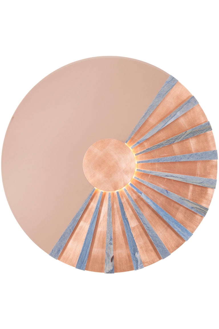 21st Century Contemporary Modern Solar Wall Rose Mirror Copper Leaf Blue Macauba Marble Handcrafted in Portugal - Europe by Greenapple

This iconic mirror evokes the breathtaking golden sunsets. The inlaid copper leaf semicircle with the wooden