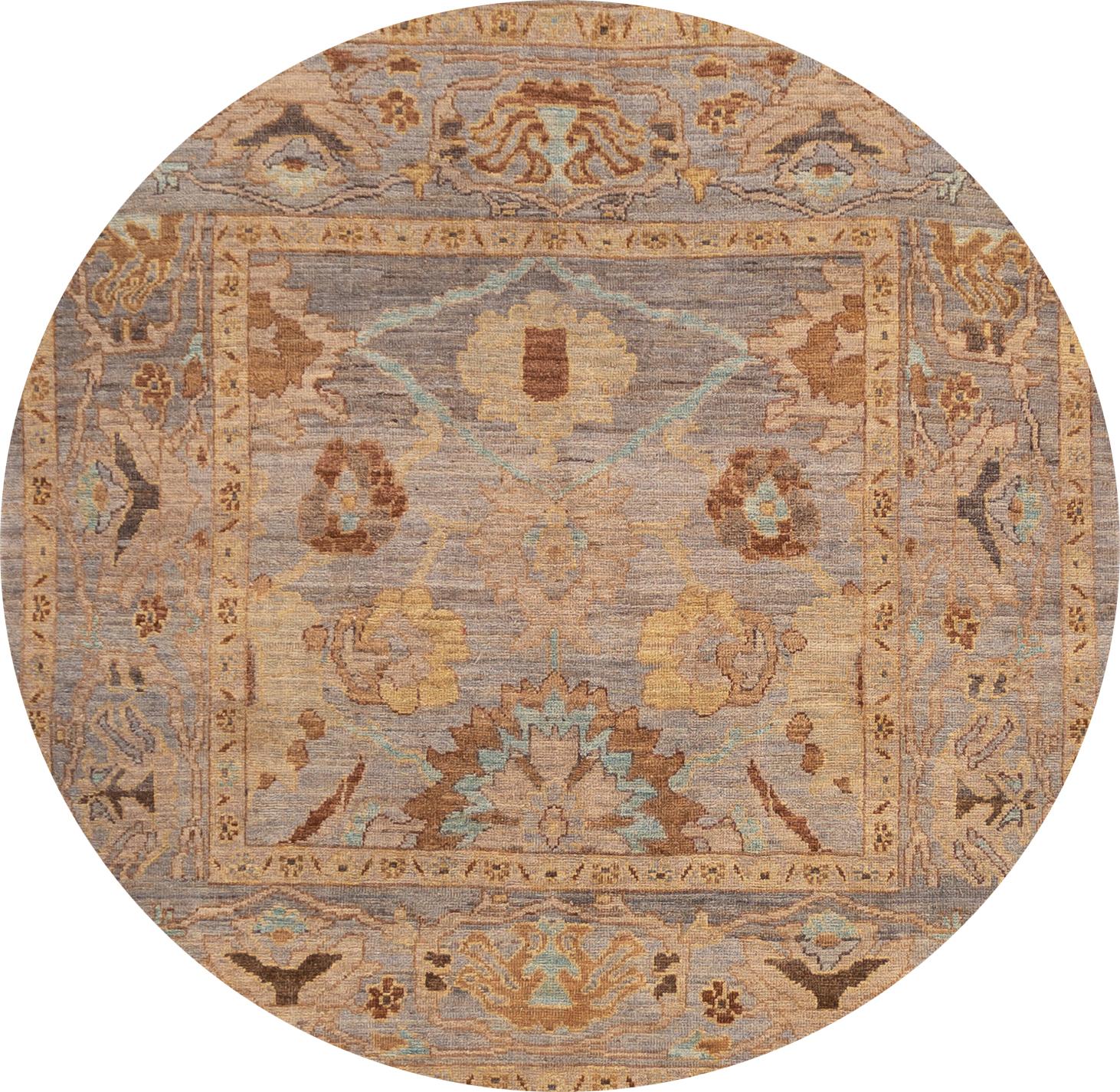 A hand knotted modern square Sultanabad rug with an all over brown motif with a gray field. 

This rug measures: 6' x 6'.
 