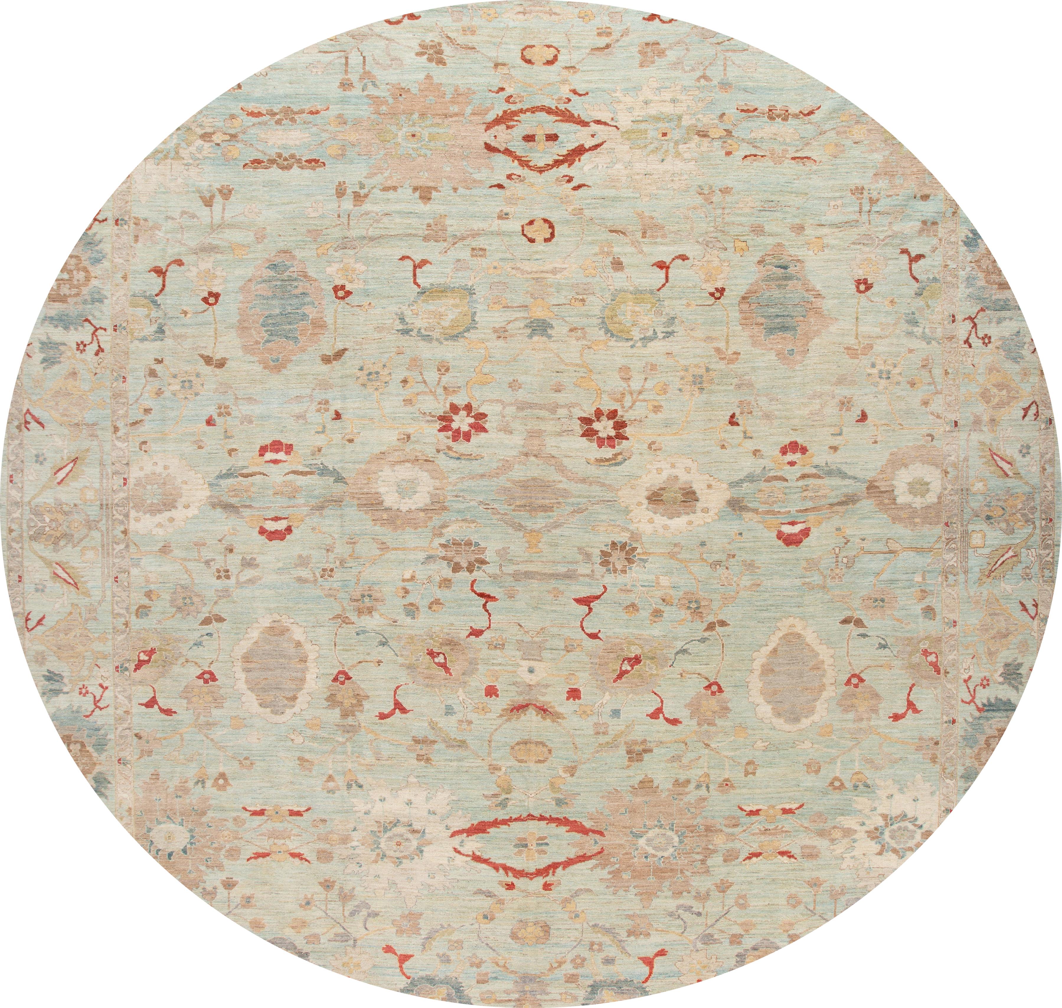 Beautiful contemporary oversize Sultanabad rug, hand knotted wool with a light aqua field, slim tan frame, tan, ivory and rust accents in all-over multi medallion design.
This rug measures: 15'10