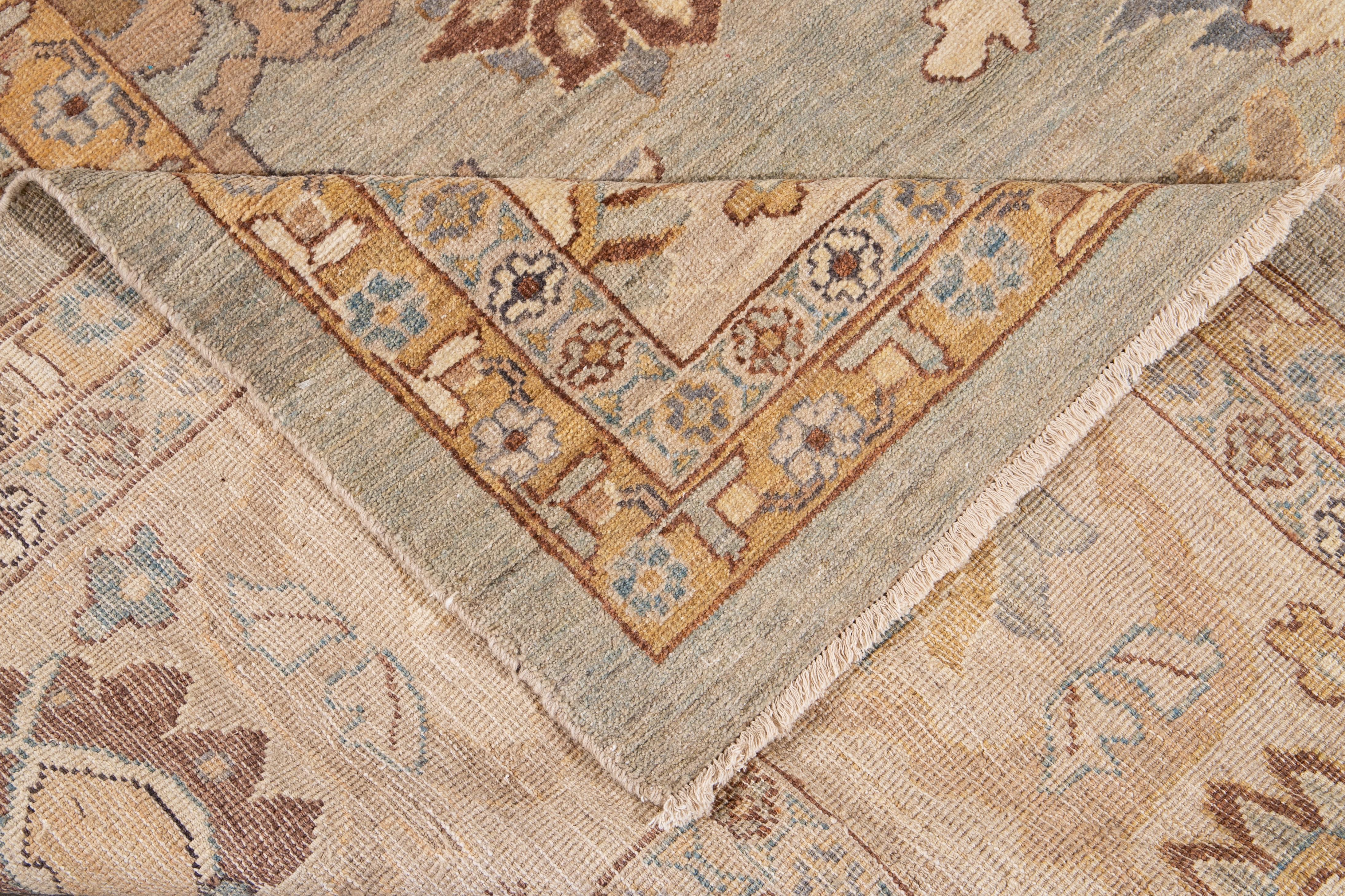 Wunderschöner moderner Sultanabad-Teppich aus handgeknüpfter Wolle mit grau-beigem Feld. Dieser Sultanabad-Teppich hat braune, hellbraune und blaue Akzente in einem prächtigen klassischen Blumenmuster.

Dieser Teppich misst: 13'9