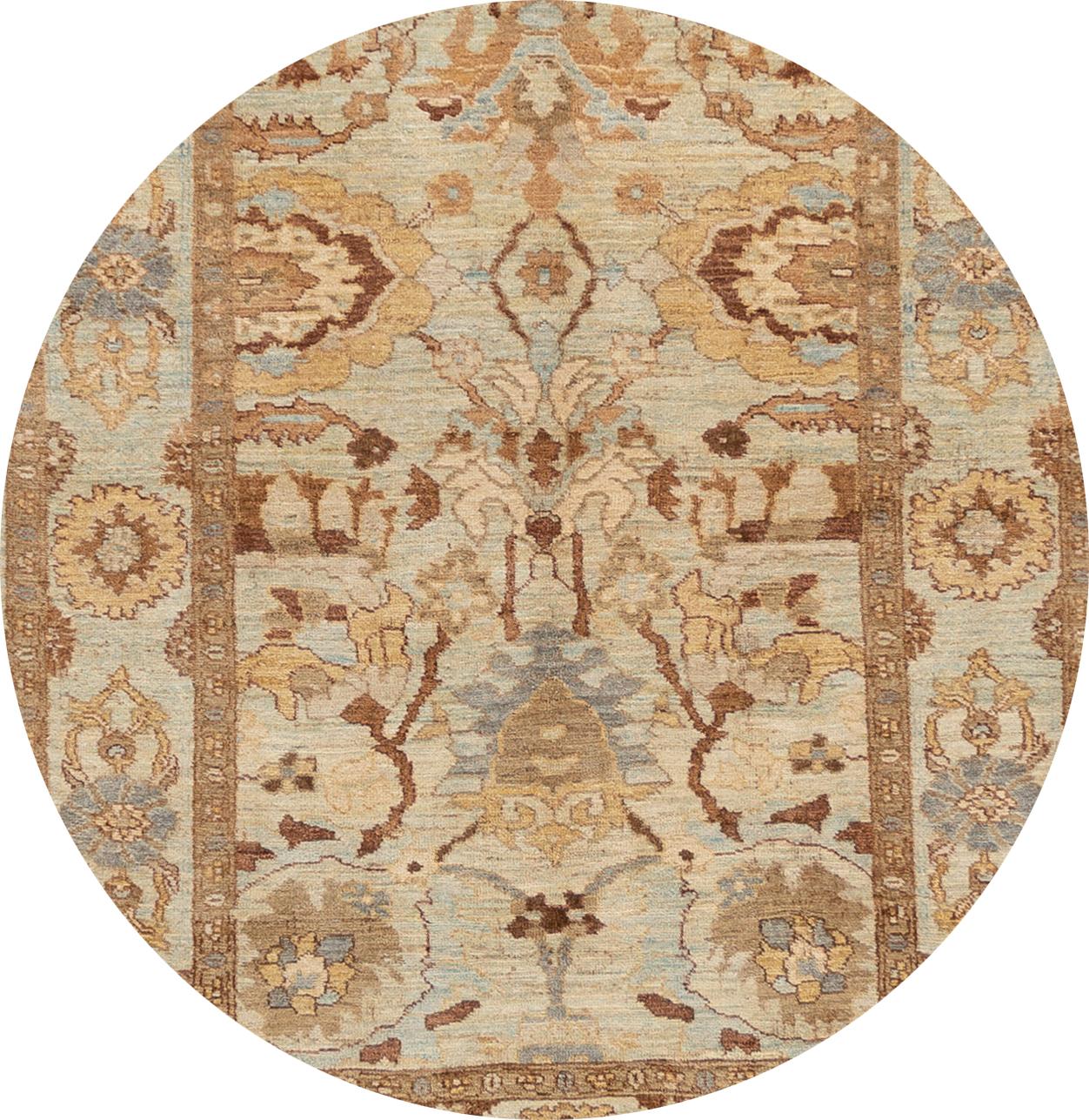 A beautiful 21st century modern Persian Sultanabad, hand knotted rug with a beige motif and border. This collection is of wool and made in Iran. 
This rug measures: 5'3