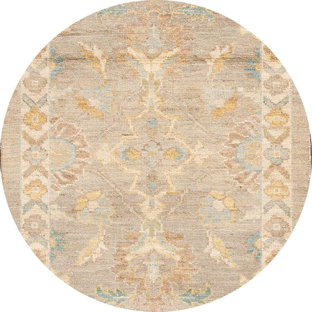 Beautiful contemporary Sultanabad runner rug, hand knotted wool with a tan field, blue and yellow accents all-over the design.
This rug measures 2' 11