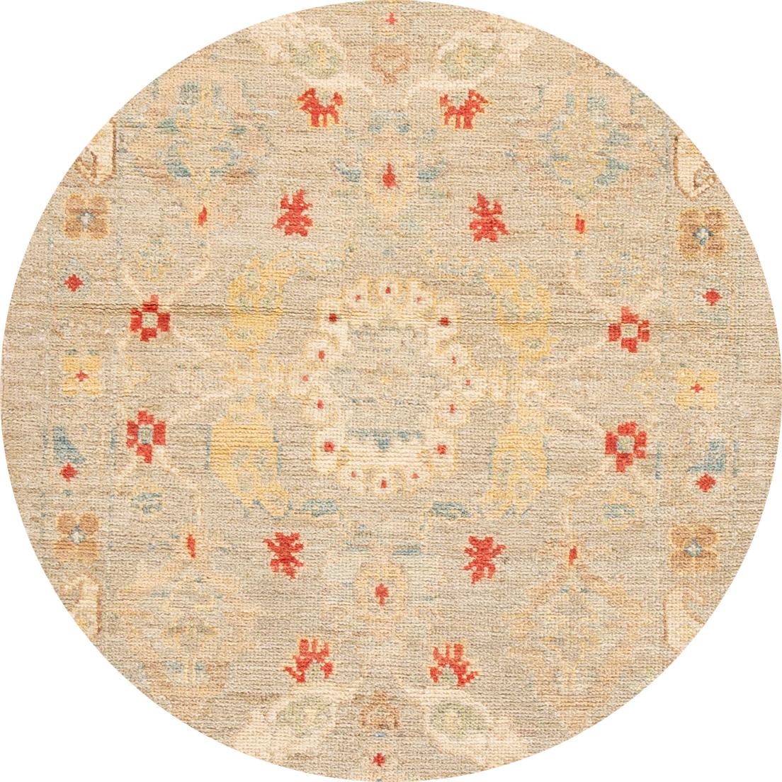 Beautiful contemporary Sultanabad runner rug, hand knotted wool with an tan field, red, blue and ivory accents all-over the design.
This rug measures 3' 1