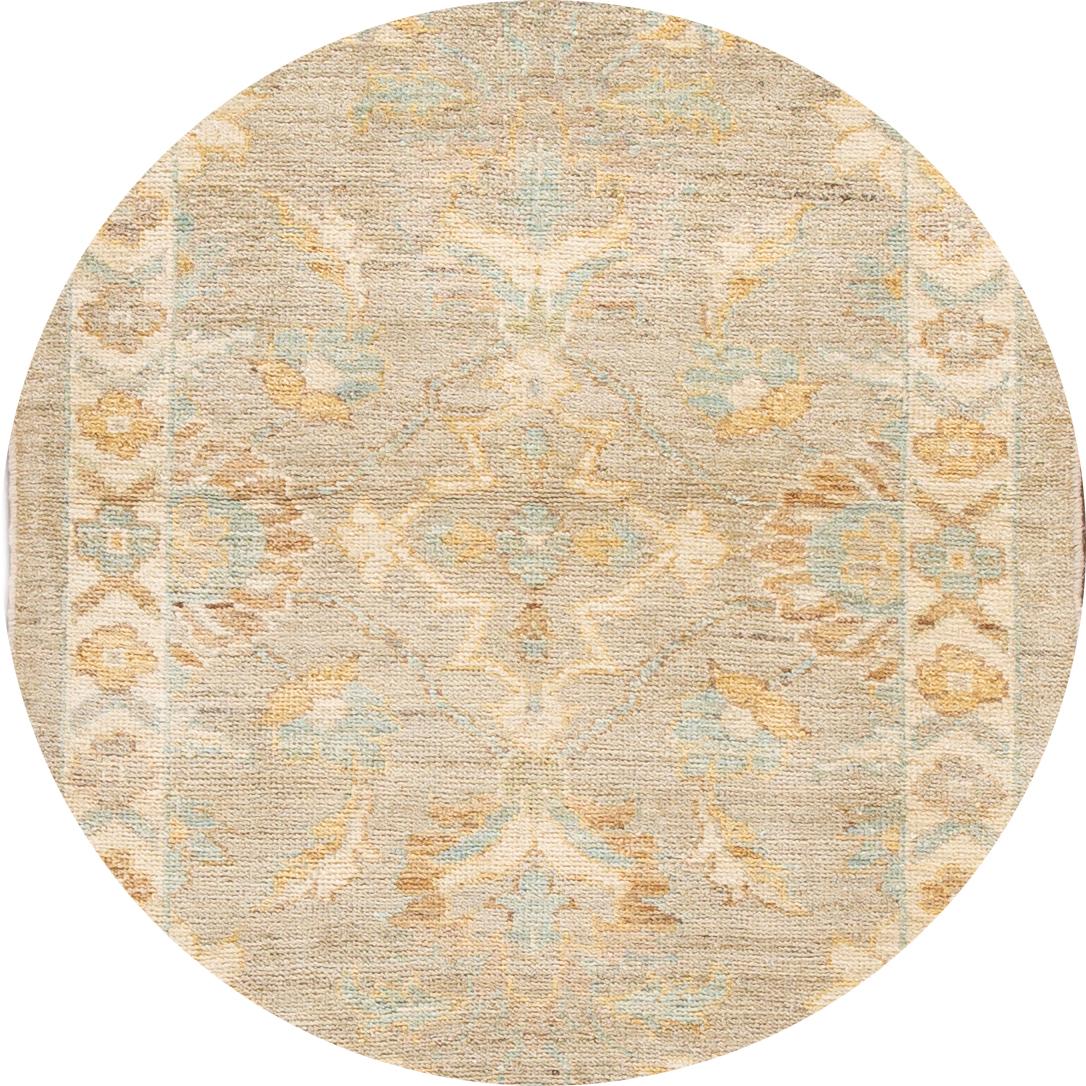 Beautiful contemporary Sultanabad runner rug, hand knotted wool with a tan field, light blue and ivory accents an all-over the palmettes and vinescrolls design.
This rug measures 3' x 9' 8