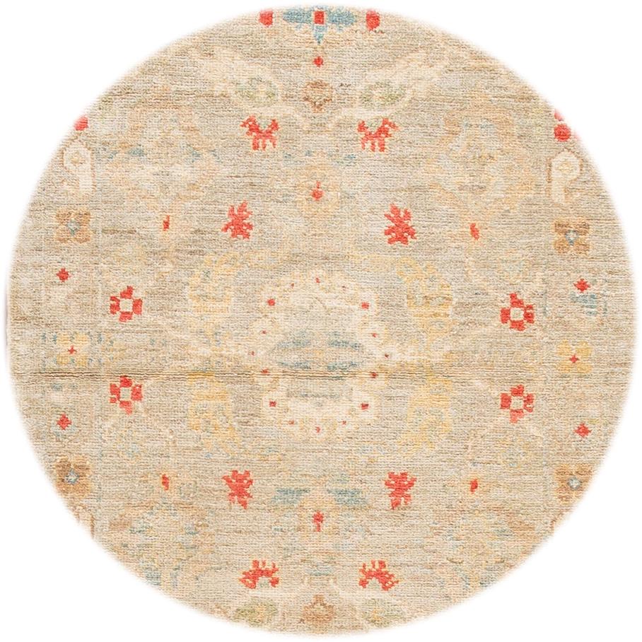 Beautiful contemporary Sultanabad runner rug, hand knotted wool with a tan field, and a deep rose red accents an all-over the design. This similarity being attributed to the magnificent graphic character of the designs.
This rug measures 3' 2