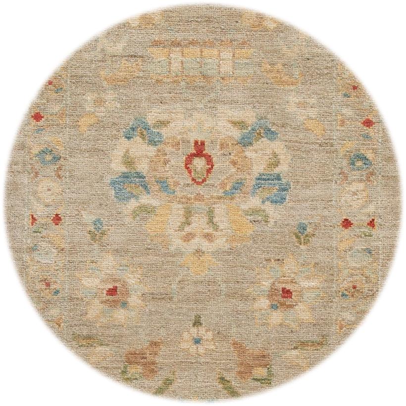 Beautiful contemporary Sultanabad runner rug, hand knotted wool with a tan field, ivory, red and blue accents in an all-over design
This rug measures 2' 10