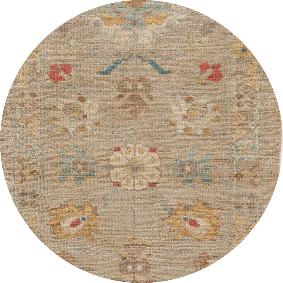 Beautiful contemporary Sultanabad runner rug, hand knotted wool with a tan field, ivory and blue accents in an all-over design
This rug measures 2' 11