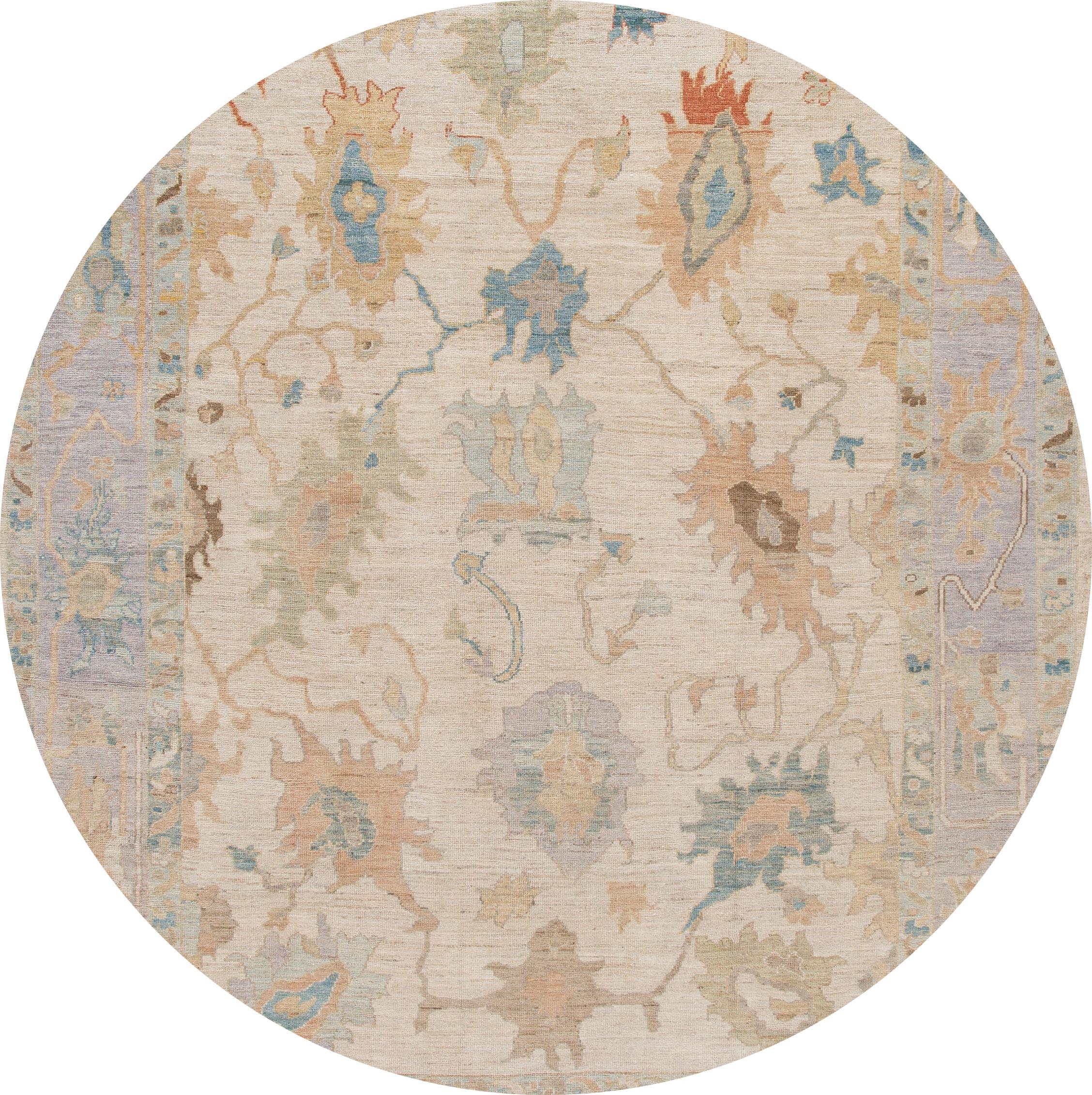 Beautiful contemporary Sultanabad rug, hand knotted wool with an ivory field. This rug has a frame of purple and multi-color accents in all-over Classic floral medallion design.

This rug measures: 9'3