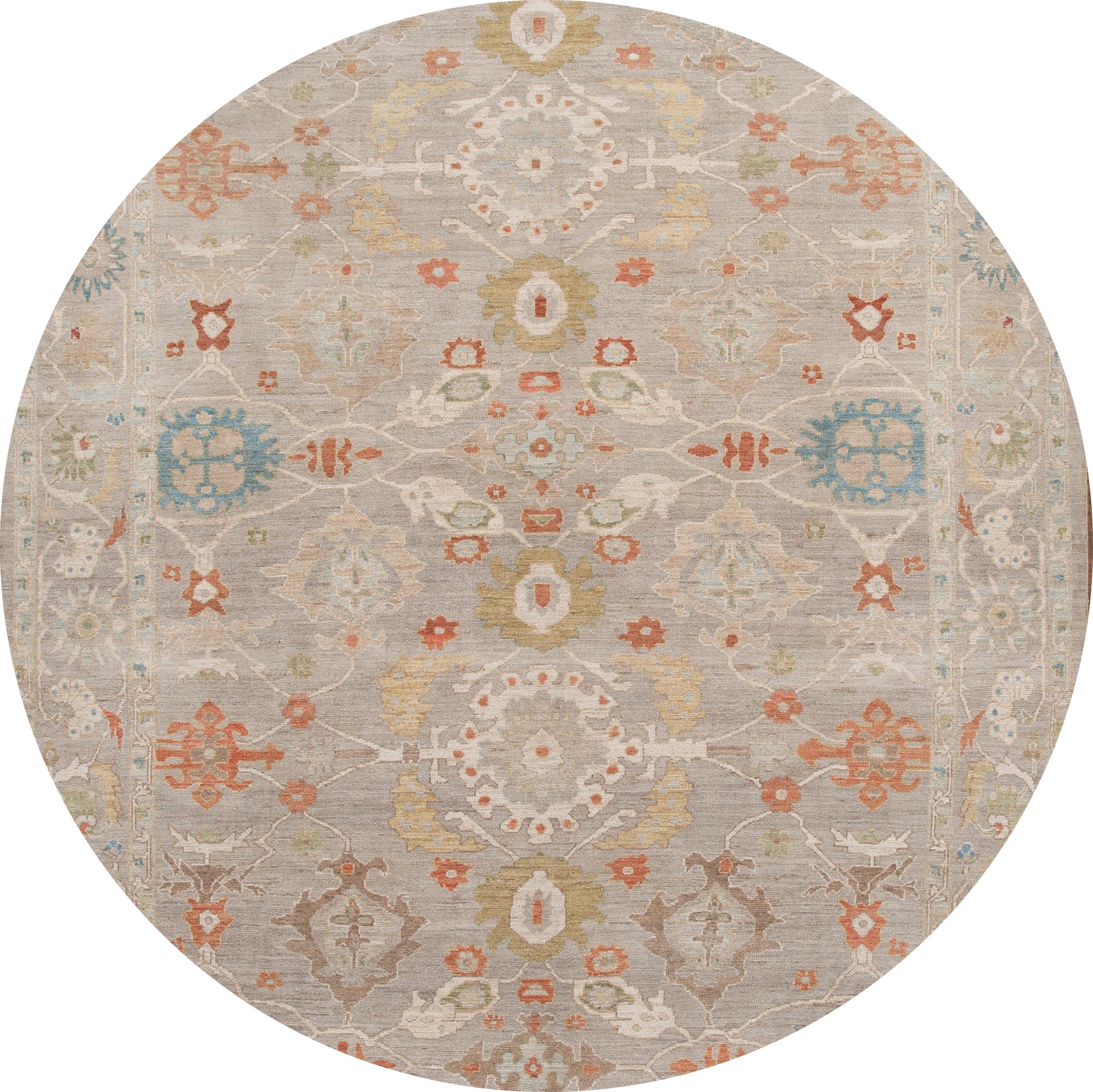 Beautiful contemporary Sultanabad rug, hand knotted wool with a gray field, and multi-color accents in all-over Classic floral medallion design.

This rug measures: 9'11