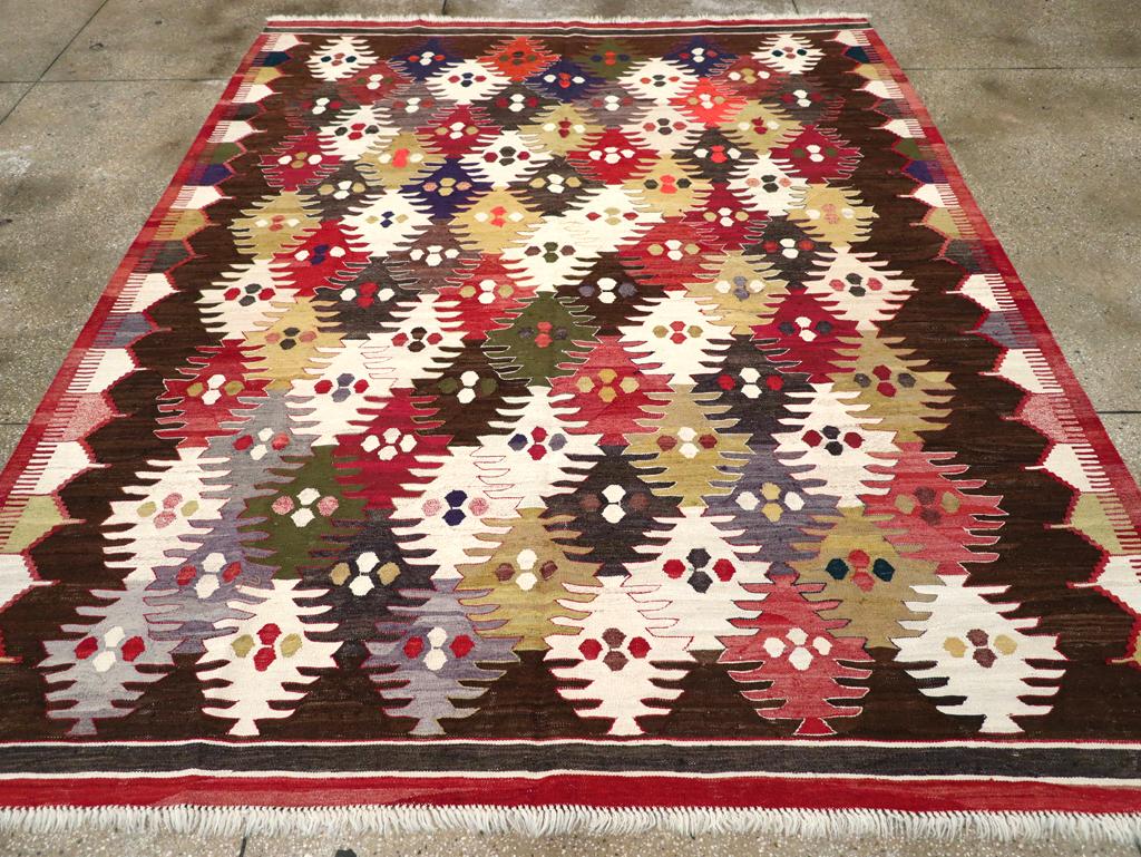 This 21st century Turkish Flatweave Kilim rug, measuring 8' 3