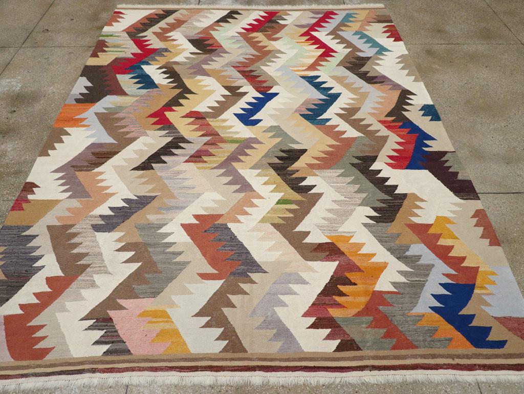 This 21st century Turkish Flatweave Kilim rug, measuring 8' 9