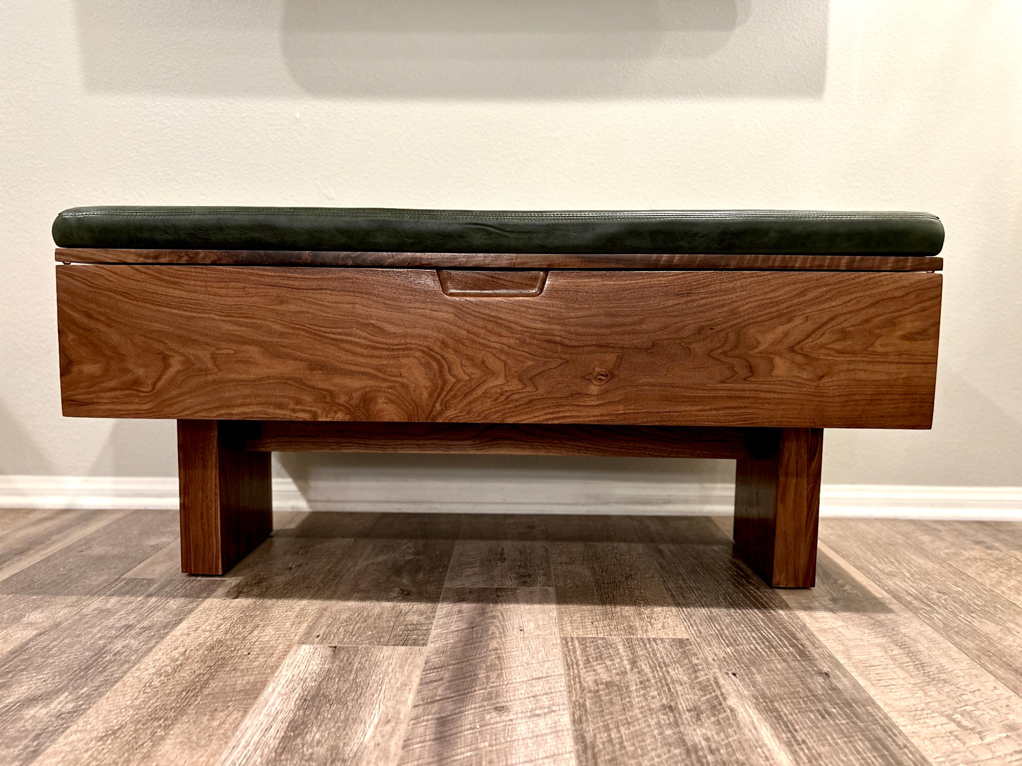 Introducing the 21st Century Modern Walnut Bench with Leather Upholstered Seat – a fusion of functionality, elegance, and timeless craftsmanship. This versatile bench is not just a piece of furniture; it's a statement of contemporary sophistication