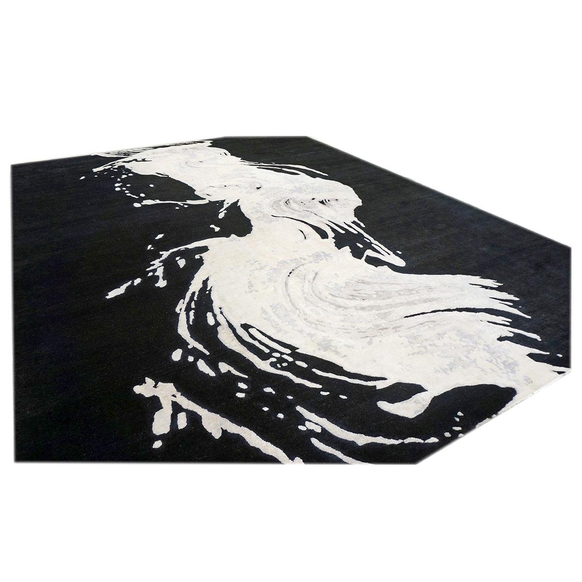 Ashly Fine Rugs presents a New Modern Inspired Wool & Silk 9x12 black & white wave handmade area rug with lustrous shiny fibers and a thick durable pile. This gorgeous collection has been designed by our in-house designer and handmade by the skilled