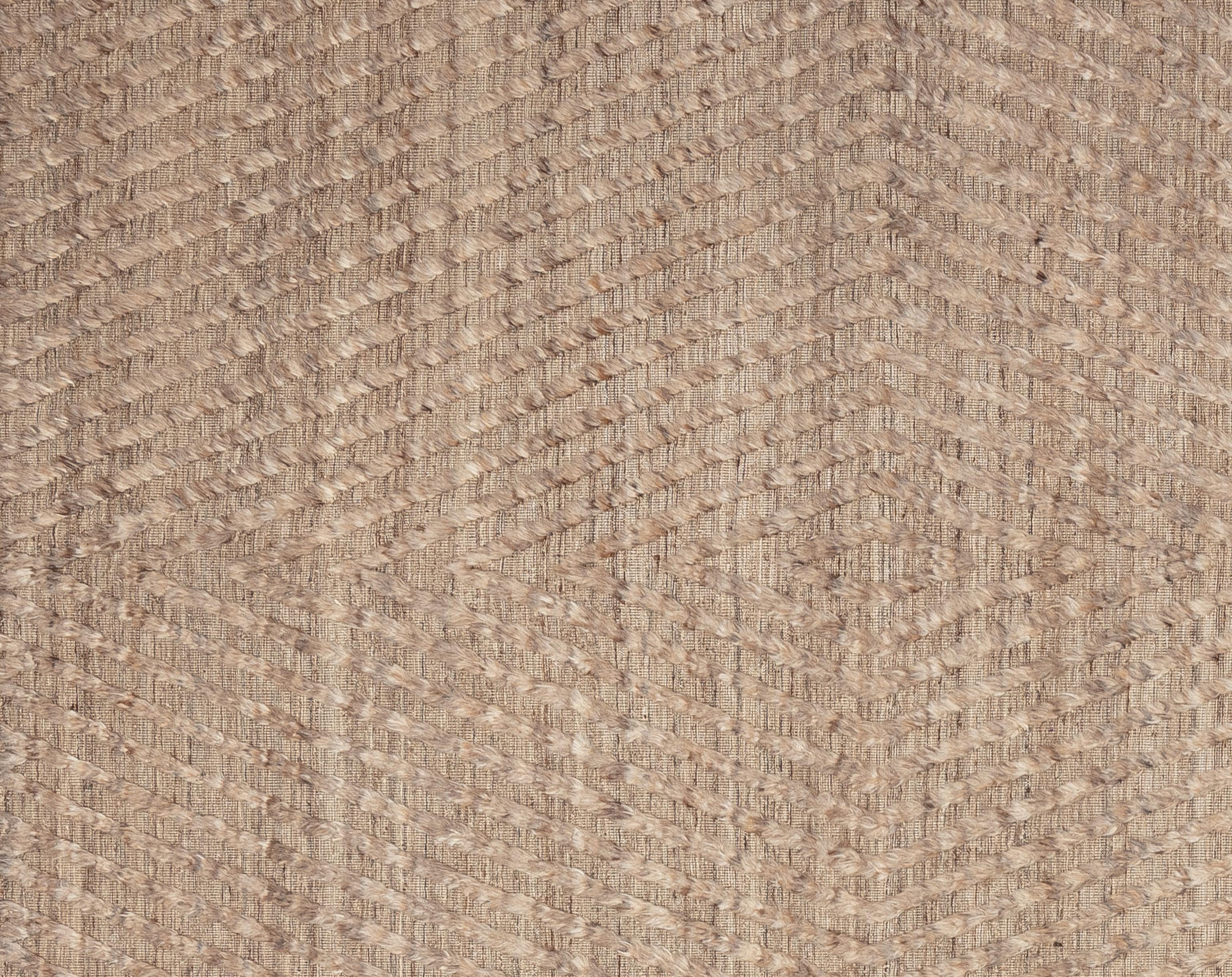 Elevate your home décor with this beautiful Moroccan rug, a true masterpiece of artisan craftsmanship. Featuring intricate geometric patterns and a captivating blend of earthy tones, this rug adds a touch of exotic elegance to any room. Handwoven