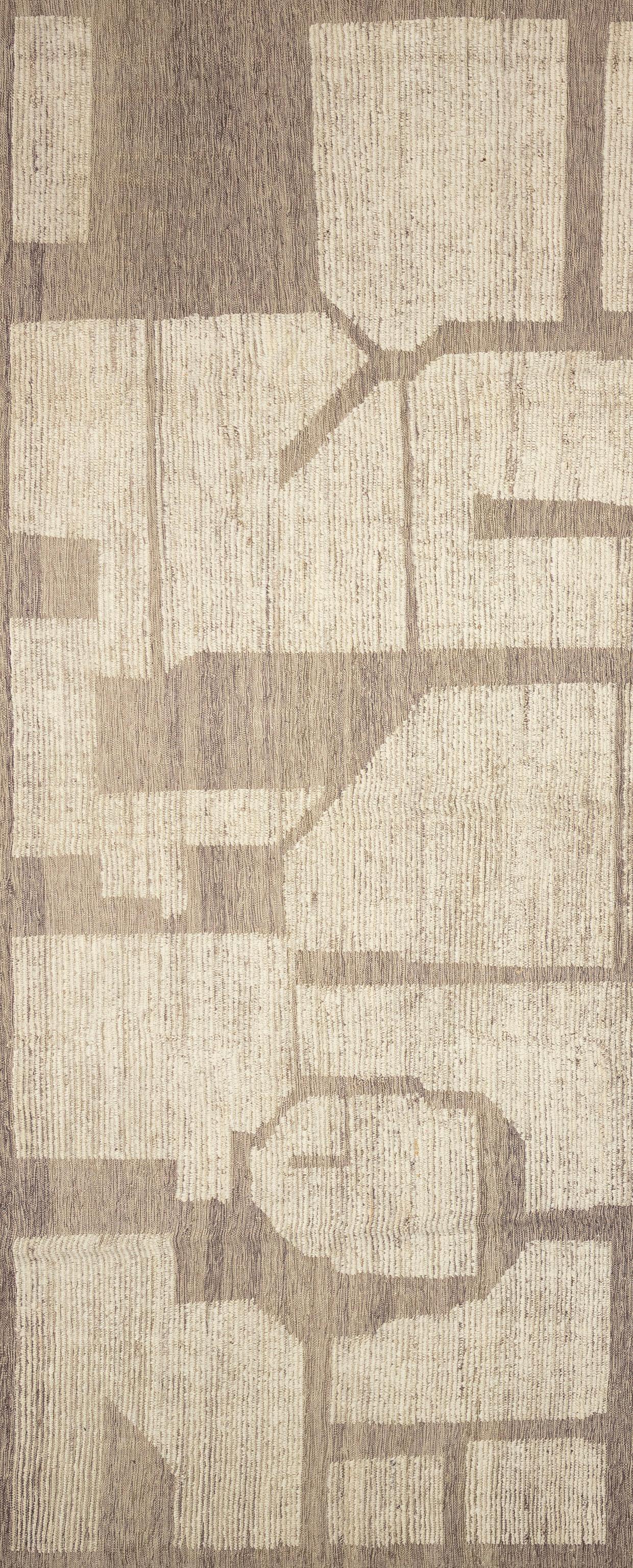 Elevate your home décor with this beautiful Moroccan inspired rug, a true masterpiece of artisan craftsmanship. Featuring intricate patterns and captivating tones. This rug adds a touch of exotic elegance to any room. Handwoven with care and