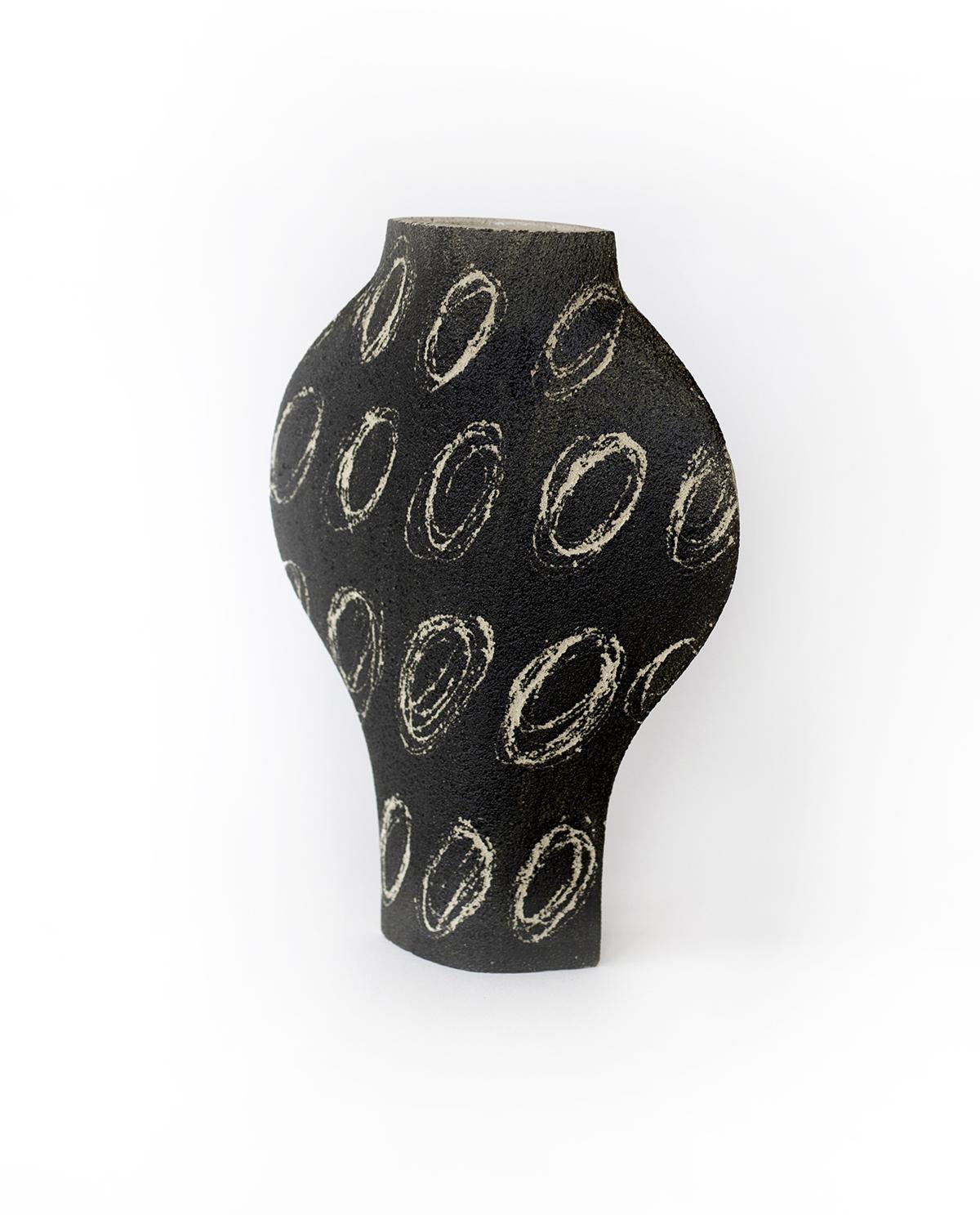 ‘Dal Negative Big Circles Black’ Ceramic Vase

This vase is part of a new series inspired by iconic Art (and more precisely paintings) movements. Here is our DAL model with motifs based on abstract paintings. The motifs are applied to the vase
