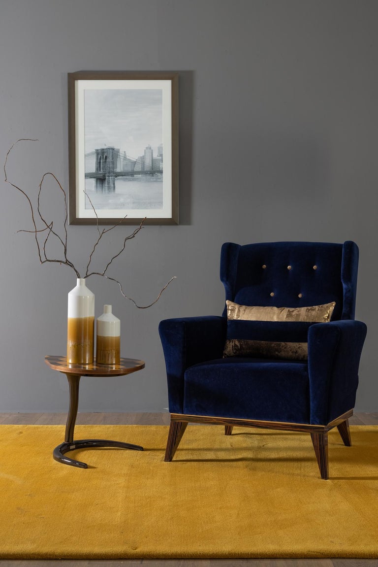 21st Century Contemporary Neoclassical Genebra Armchair Dark Blue Velvet Handcrafted in Portugal - Europe by Greenapple. 

The Genebra armchair is designed to give your living room a sophisticated vintage look. The armchair is upholstered in dark