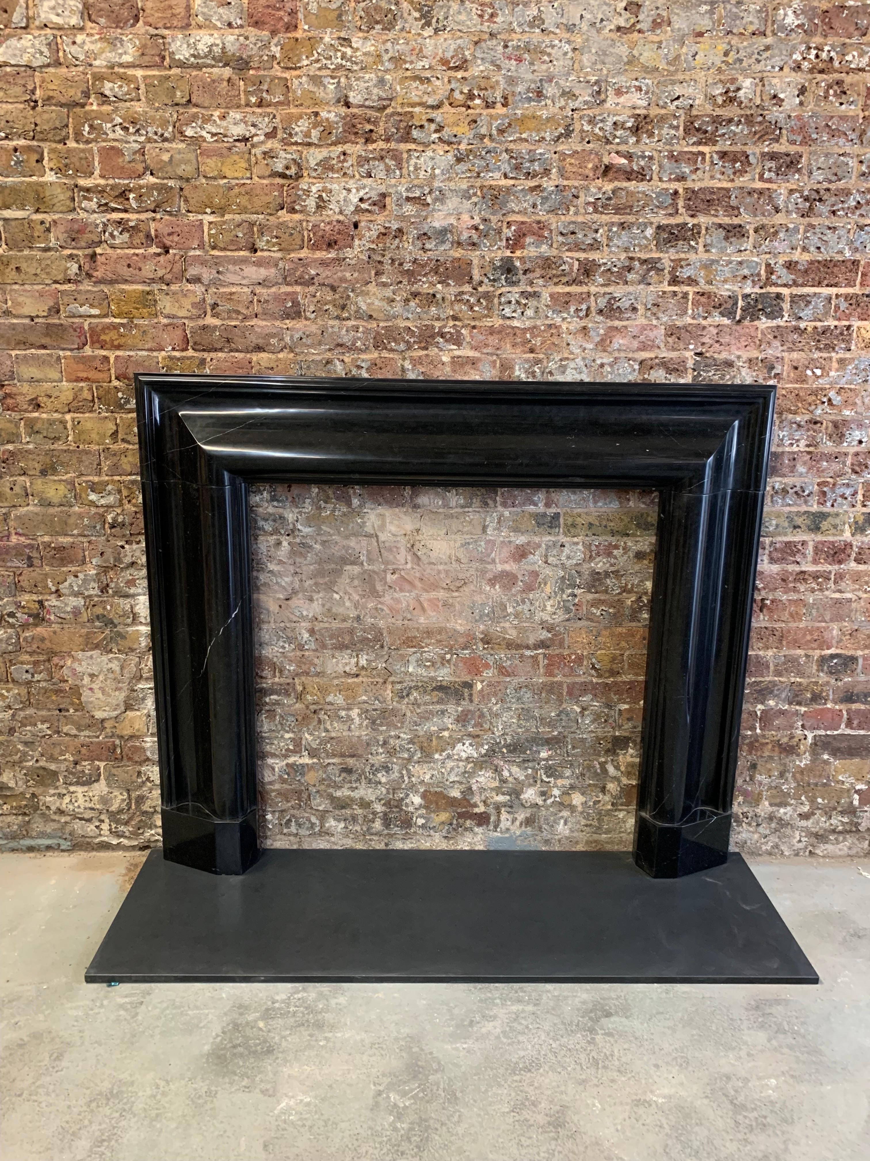 21st Century Nero Marquina Marble Fireplace Mantlepiece.
This Fine Bolection Hand Carved Marble Example Made To Original Georgian Design,
This Was Recently Made For A Very Well Known 5 Star Hotel Entrance Near Buckingham Palace London.
The Clients
