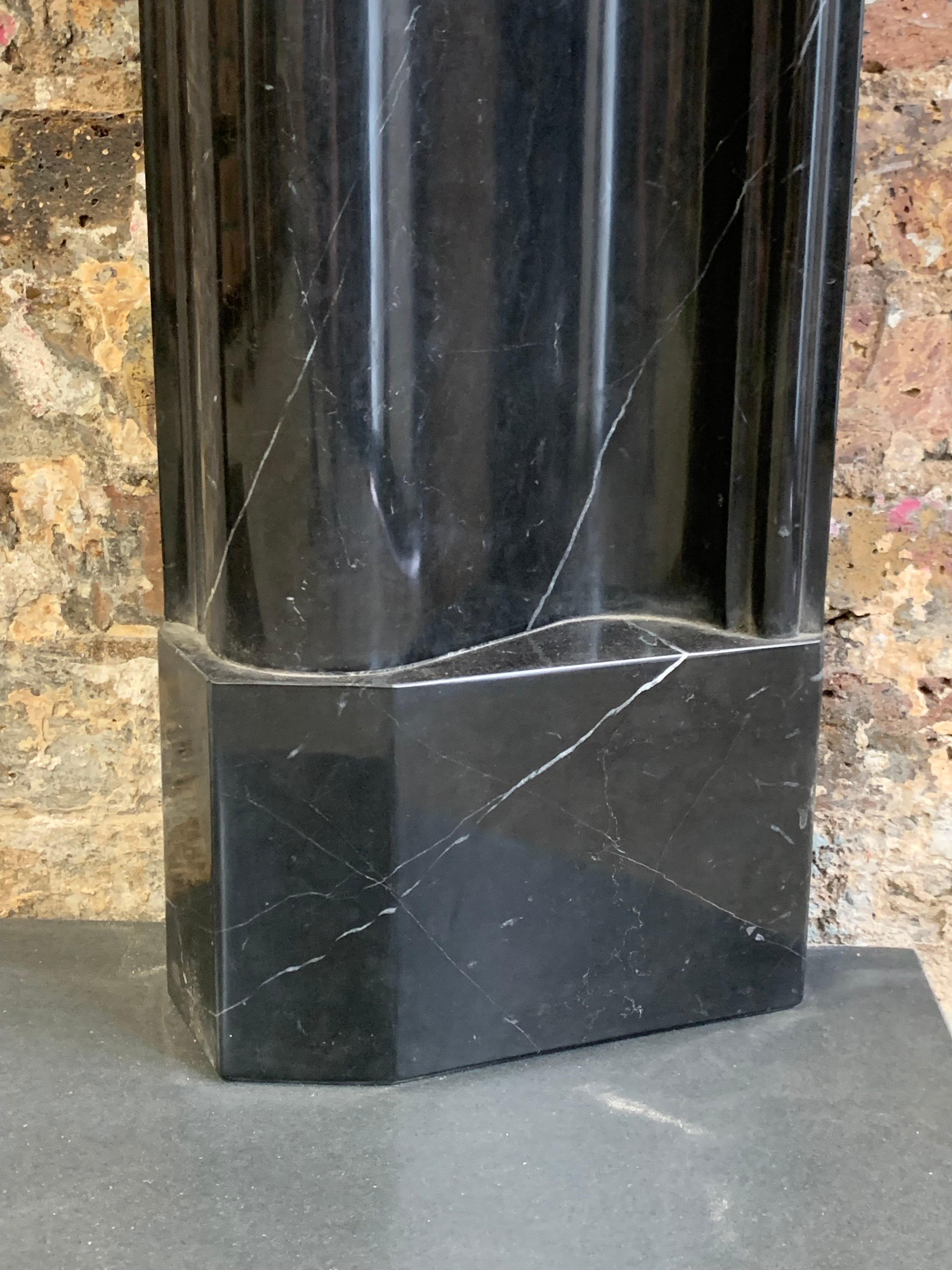 Hand-Carved 21st Century Nero Marquina Marble Bolection Fireplace