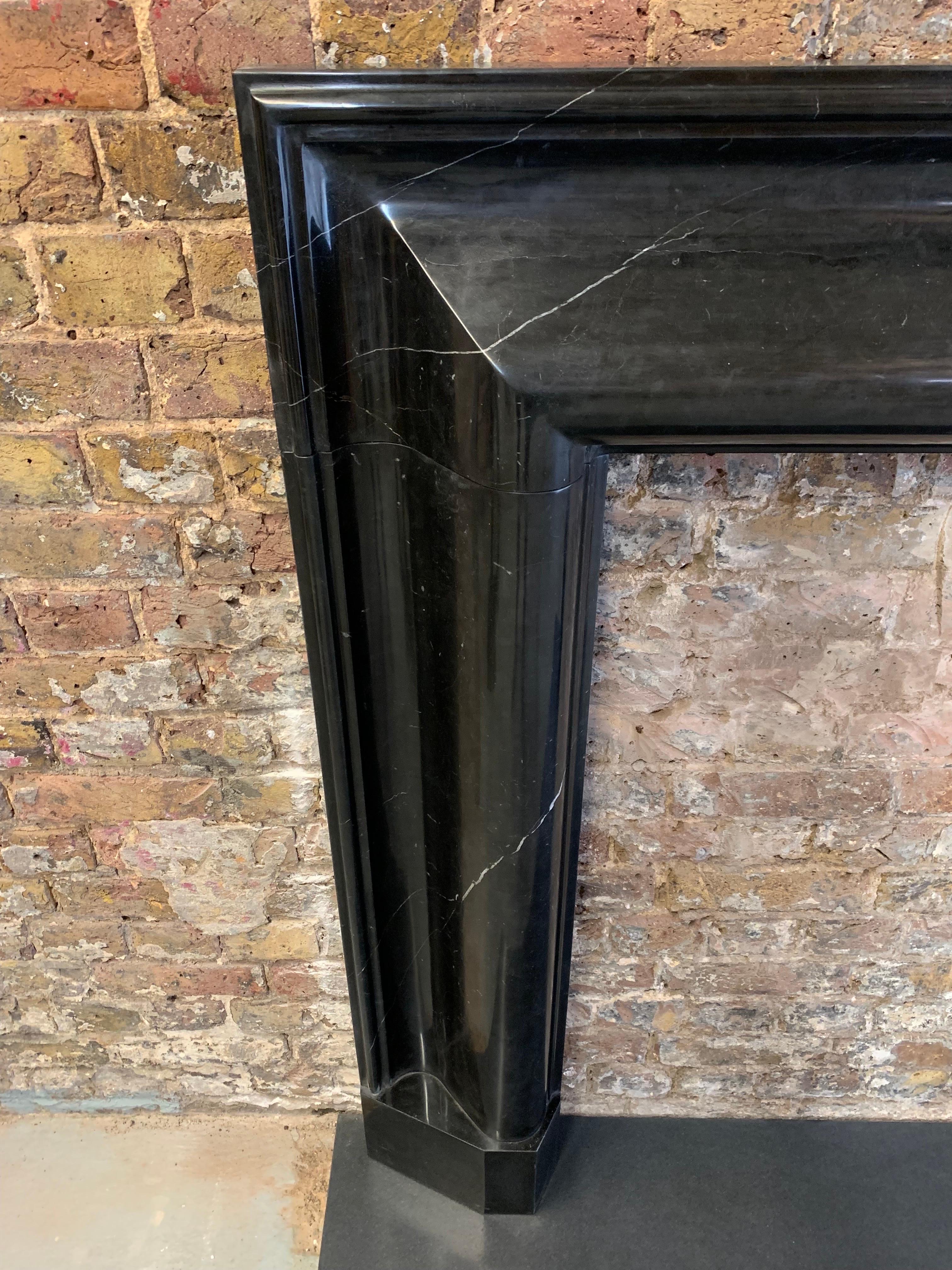 21st Century Nero Marquina Marble Bolection Fireplace In Good Condition In London, GB