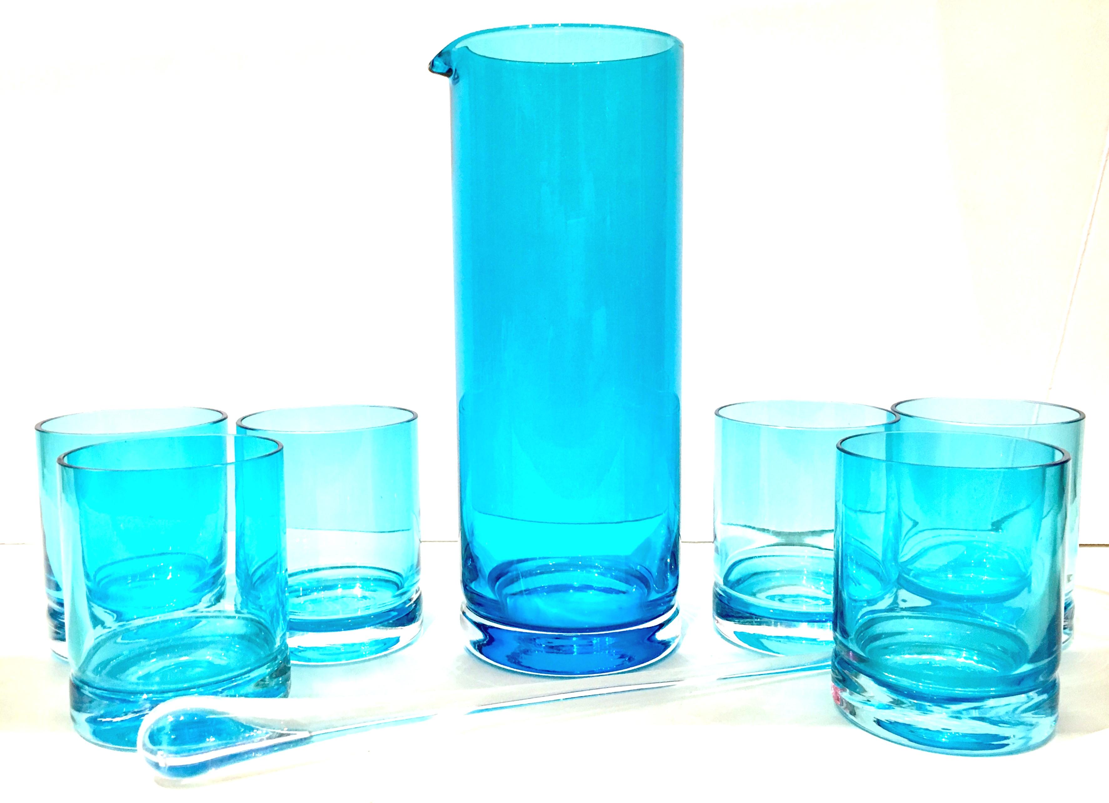 21st century and new blown glass blue drinks set of eight pieces.
Set includes, on spouted drinks pitcher, one clear cocktail stirrer and six double old fashion glasses.
Double old fashion glass: 4