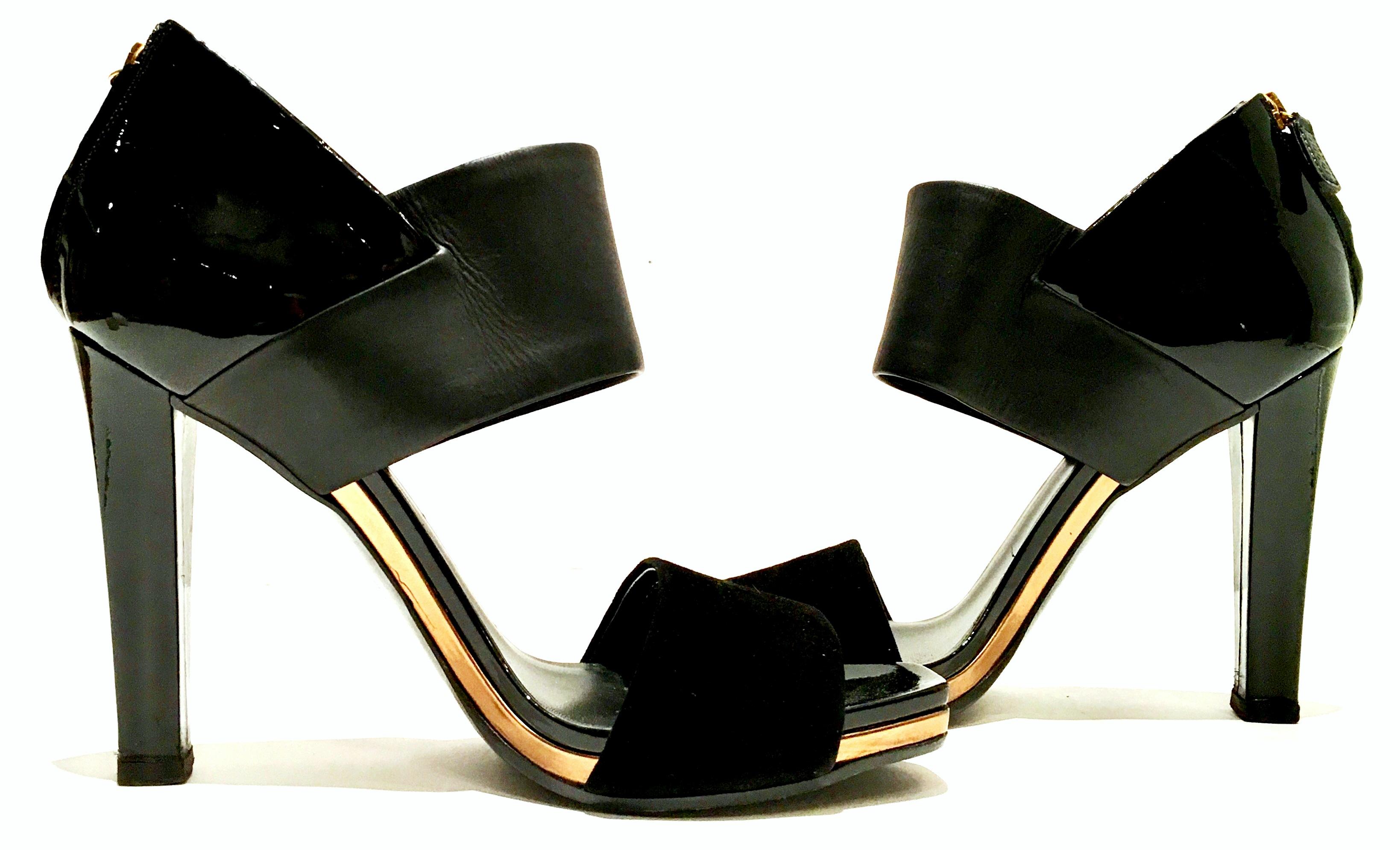 21st Century Gucci leather patent leather and suede strap platforms shoes, size 8.5. These new, out of the box black and bronze/gold platform strappy sandals feature a 4