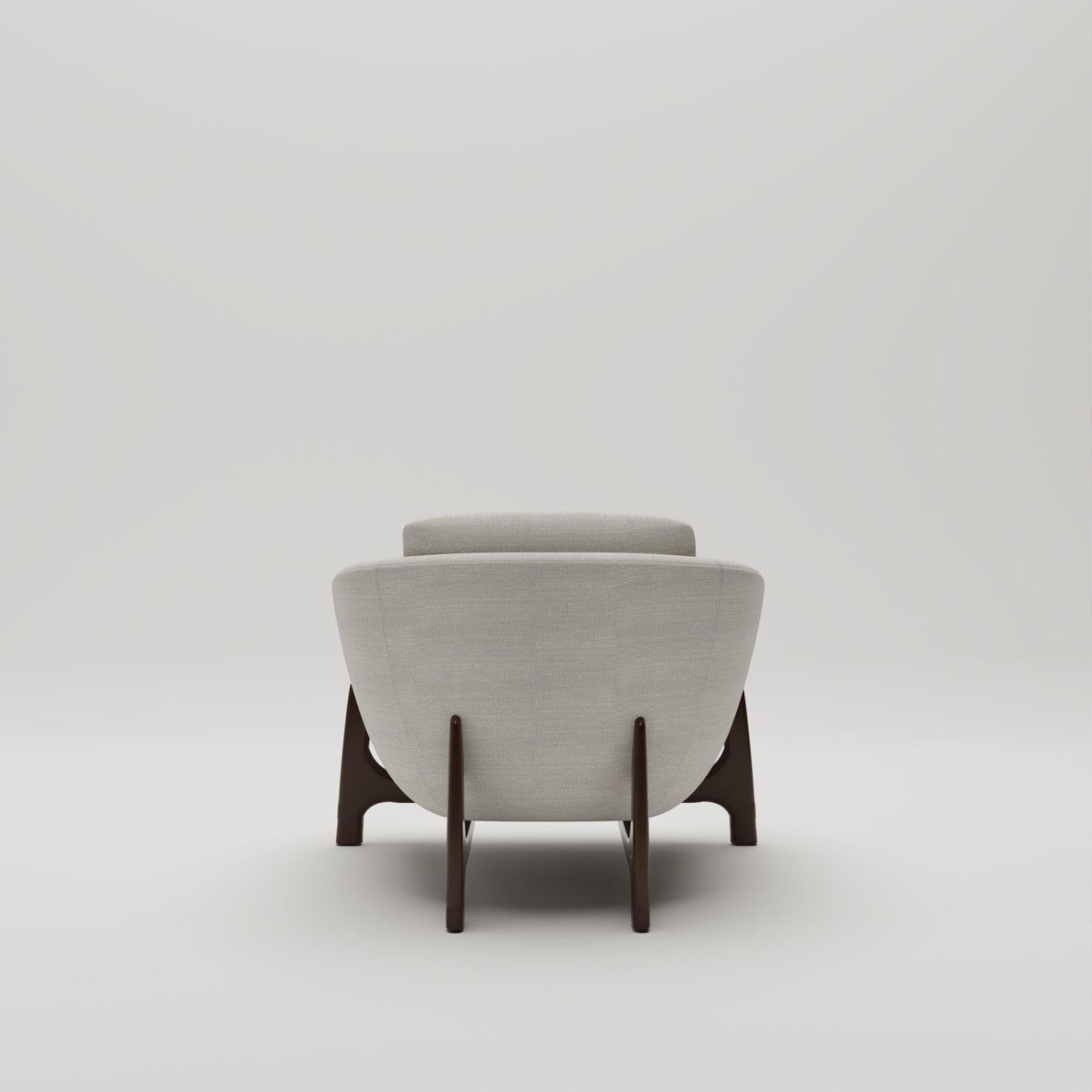 Oscar Wood Armchair, in Darkened Sycamore, Handcrafted in Portugal by Duistt

Inspired by the poetic curves of Oscar Niemeyer's architecture, the Oscar Collection captivates with its sensual, flowing lines. Echoing Niemeyer's belief that ‘’curves
