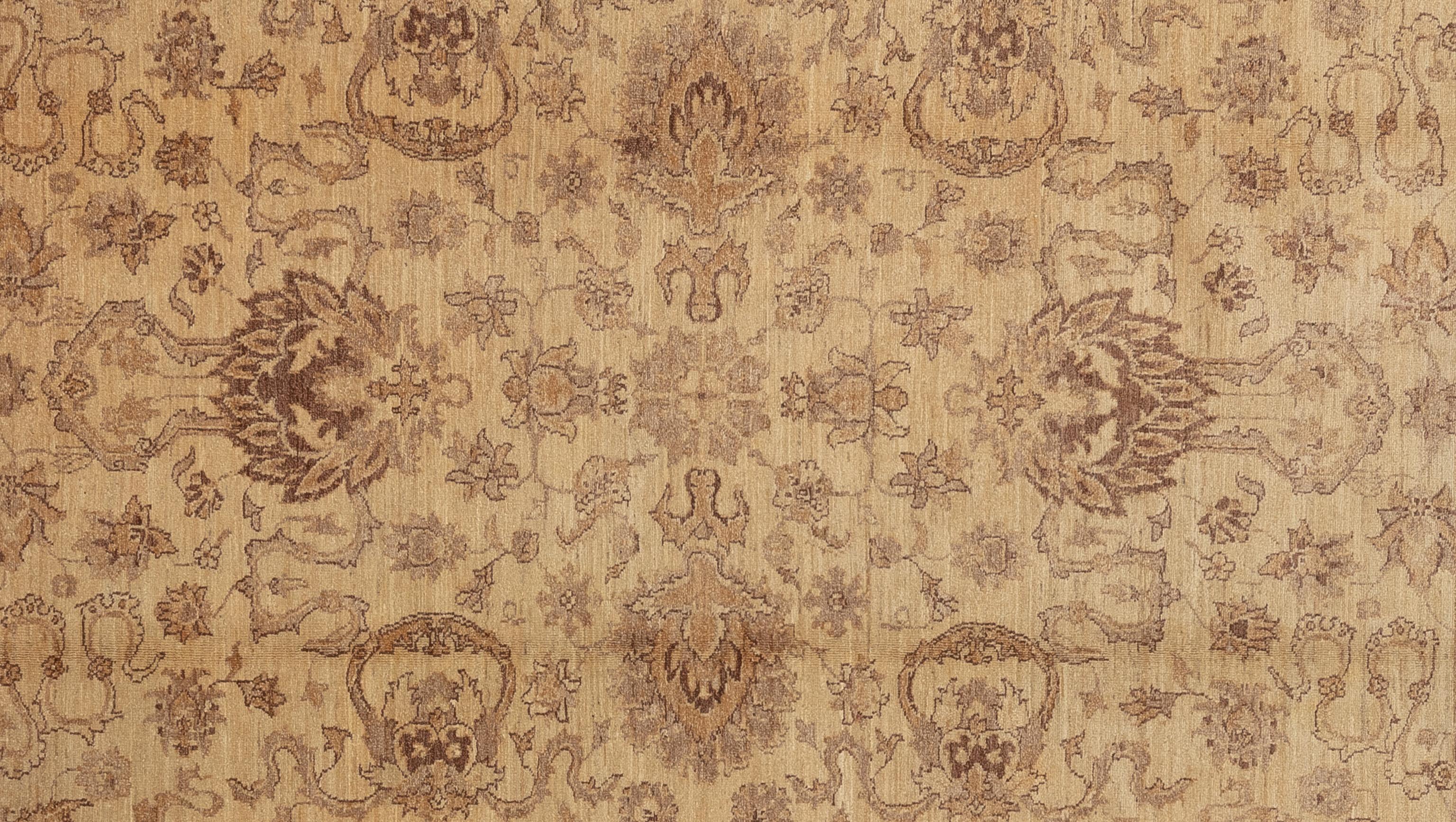 This exquisite Oushak rug is a true work of art skillfully handwoven by experienced artisans using traditional methods. Adorned with intricate patterns and a gentle color scheme crafted from natural vegetable dyes, this rug, is a striking focal