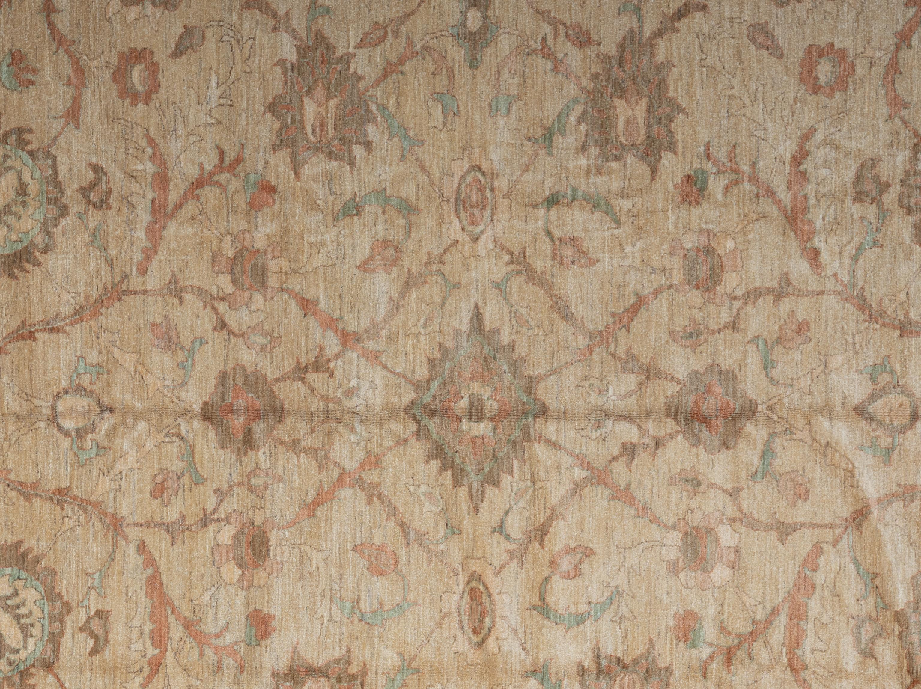 This exquisite Oushak rug is a true work of art skillfully handwoven by experienced artisans using traditional methods. Adorned with intricate patterns and a gentle color scheme crafted from natural vegetable dyes, this rug, is a striking focal
