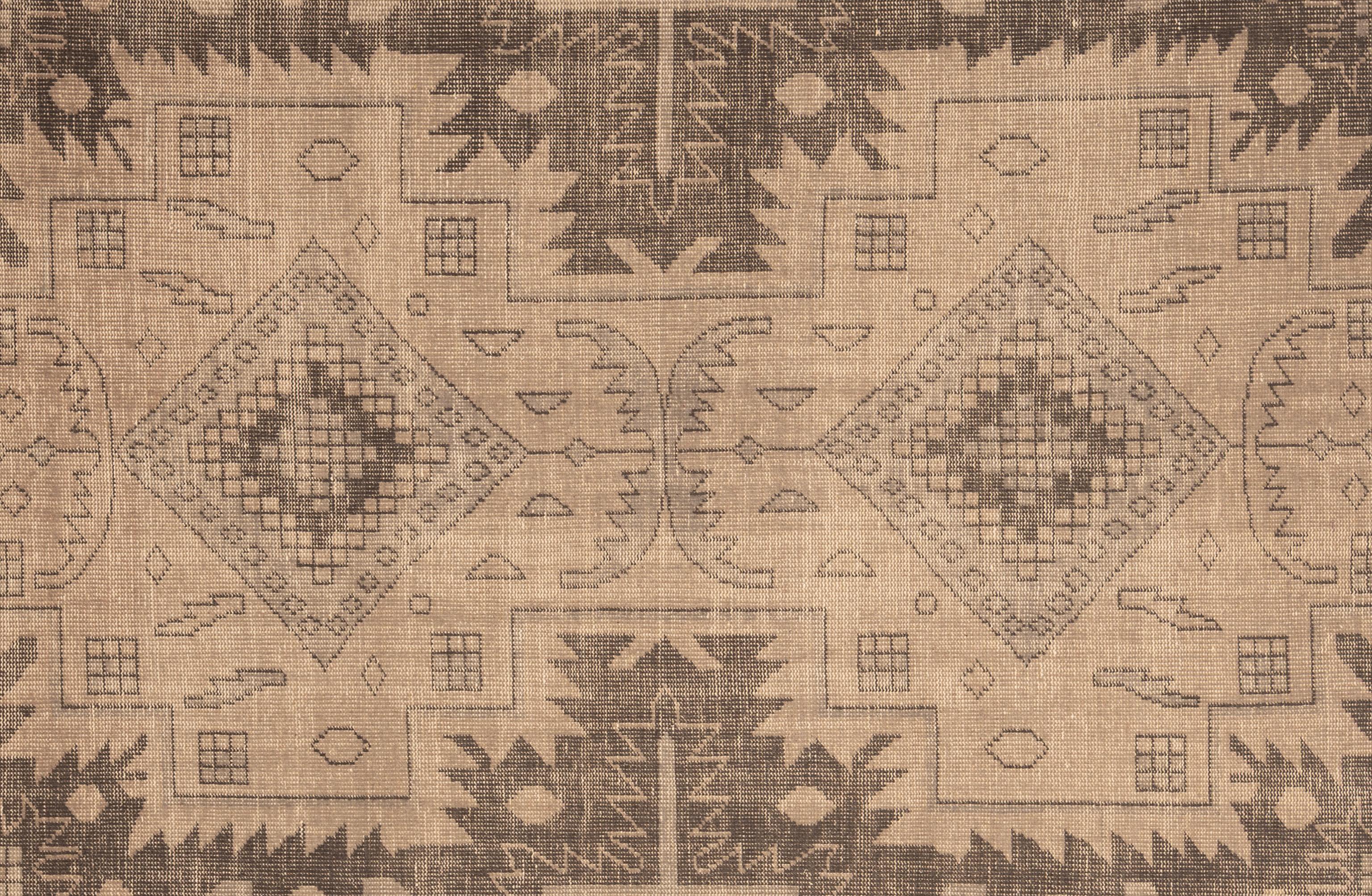 This Oushak rug is hand-knotted from pure wool, offering both durability and a soft, inviting texture underfoot. Its design draws inspiration from classic motifs, reimagined in a soothing palette of neutral tones that bring a sense of calm and
