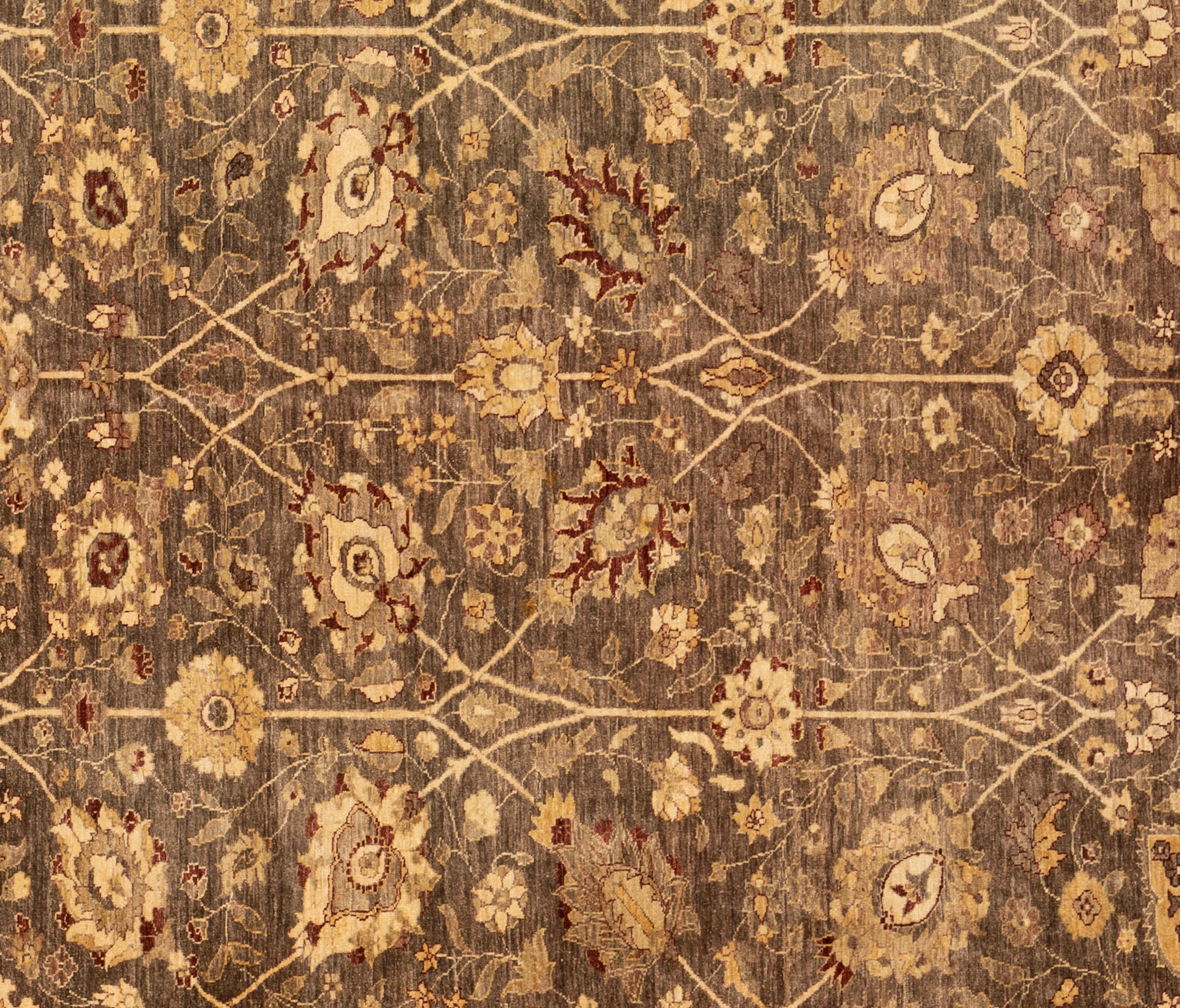 This Oushak rug is hand-knotted from pure wool, offering both durability and a soft, inviting texture underfoot. Its design draws inspiration from classic motifs, reimagined in a soothing palette of neutral tones that bring a sense of calm and