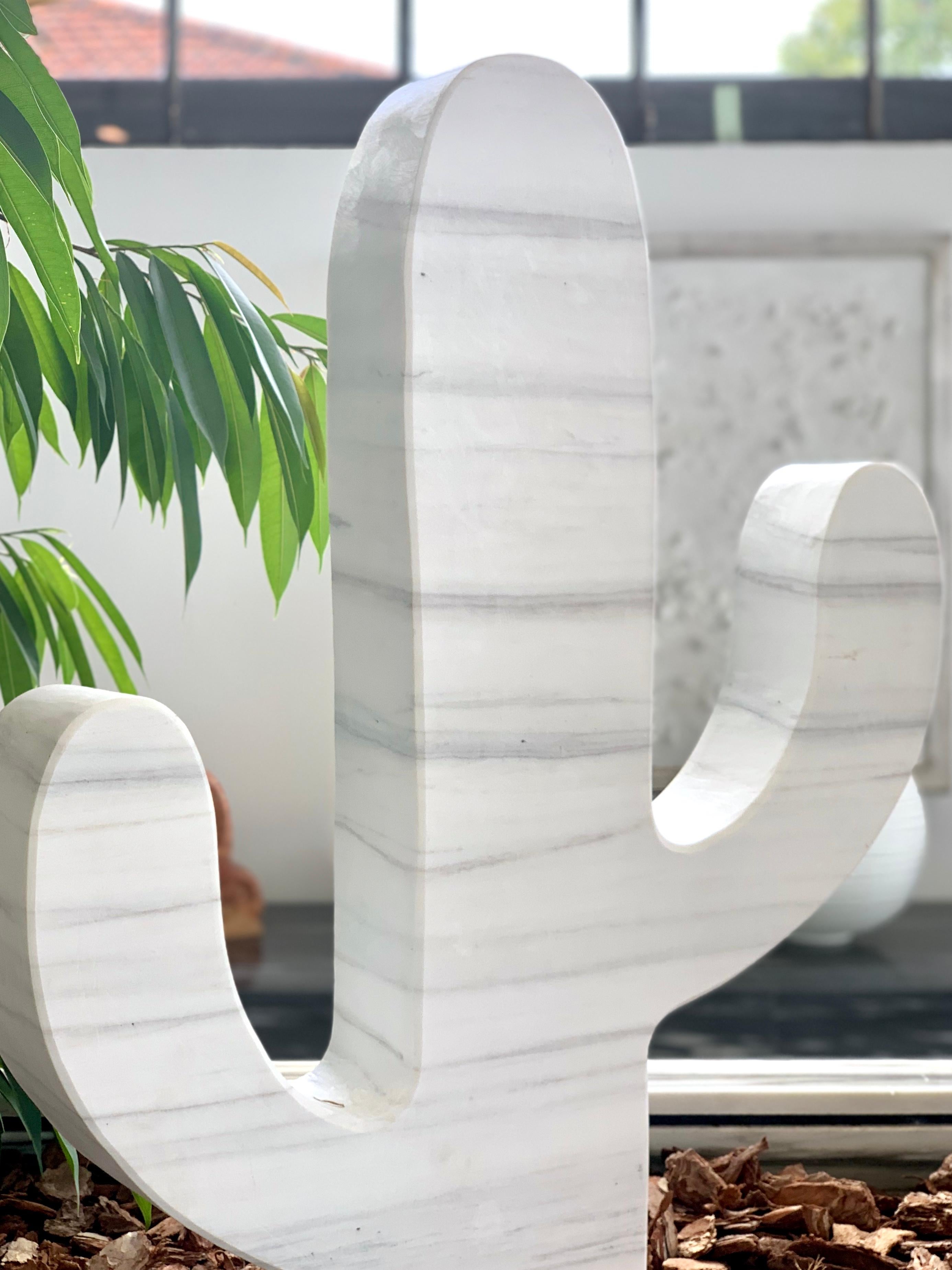 Cactus, is part of our Paonazzo statue family made in Carrara/ Italy. If placing it alone or with second one, it is definitely an eyecatcher!
Its special material, Paonazzo Marble, displays a wonderful color range including a likely white and beige
