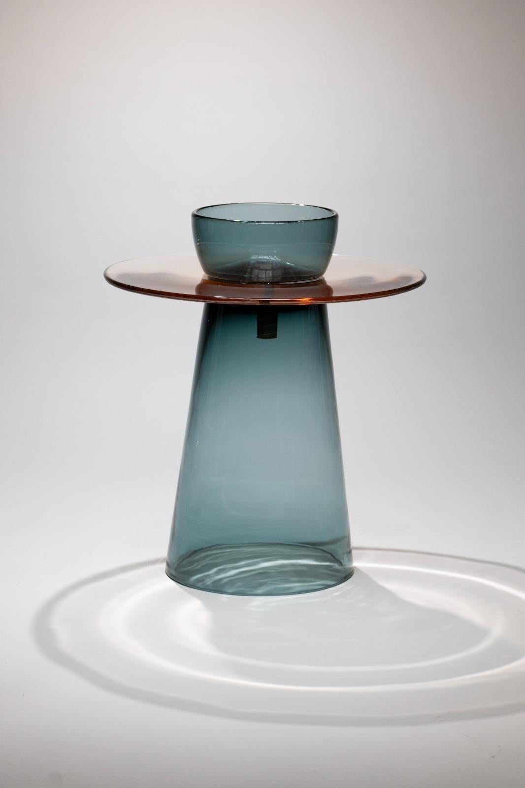 Angels is a collection of tables in Murano glass designed by the 
Paritzki&Liani (Tel Aviv, Israel) for Purho in 2023.
Like ethereal figures of light and reflection, the Angels tables represent a 
small interior architecture in which the three