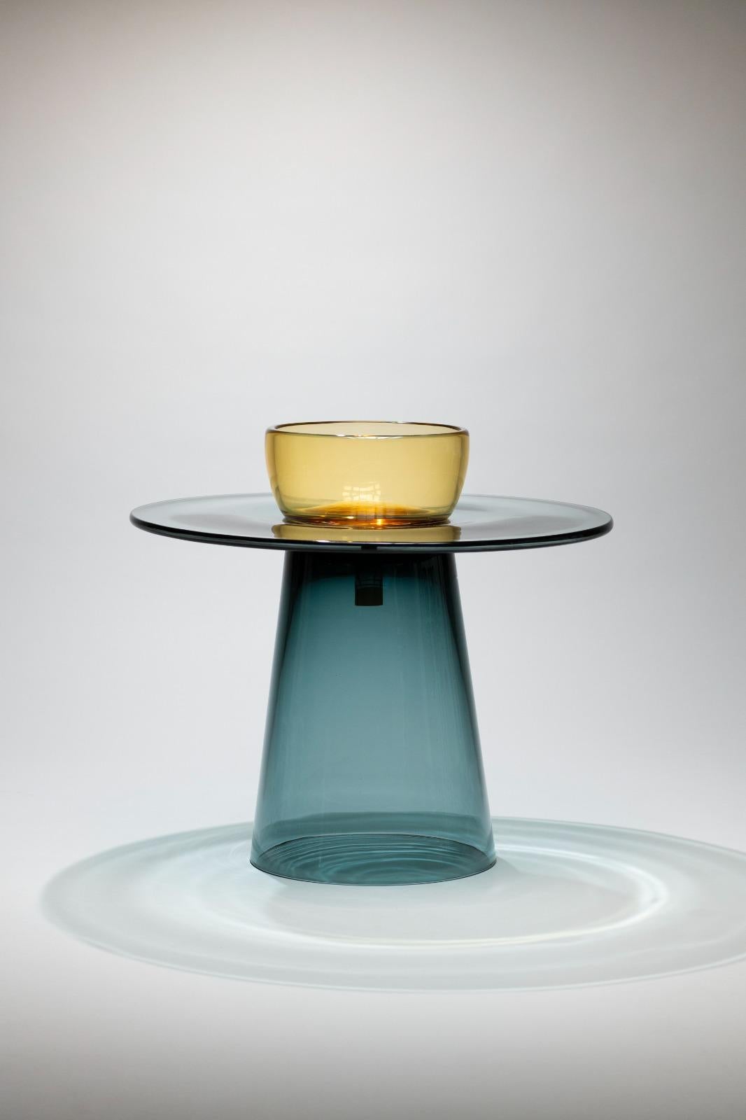 Angels is a collection of tables in Murano glass designed by the 
Paritzki&Liani (Tel Aviv, Israel) for Purho in 2023.
Like ethereal figures of light and reflection, the Angels tables represent a 
small interior architecture in which the three