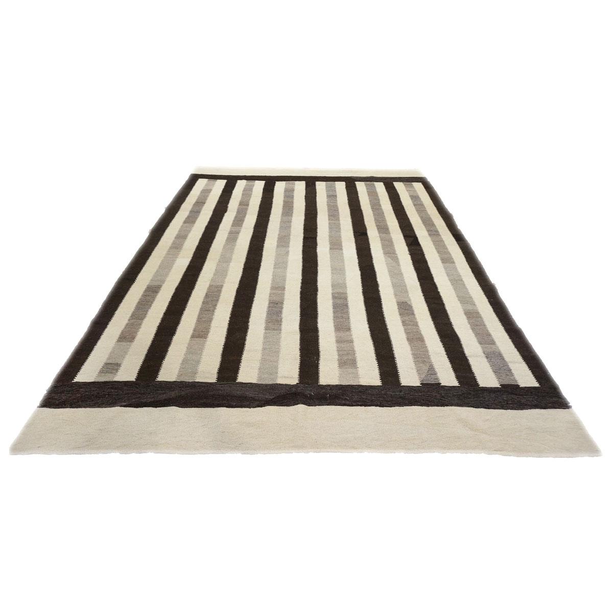 Ashly Fine Rugs presents a 21st Century Persian Flatweave Safari Kilim 8x11 Ivory & Brown Handmade Area Rug. This piece is made with 100% hand-twisted wool fibers, featuring a beautifully natural ivory background with dark brown and light grey
