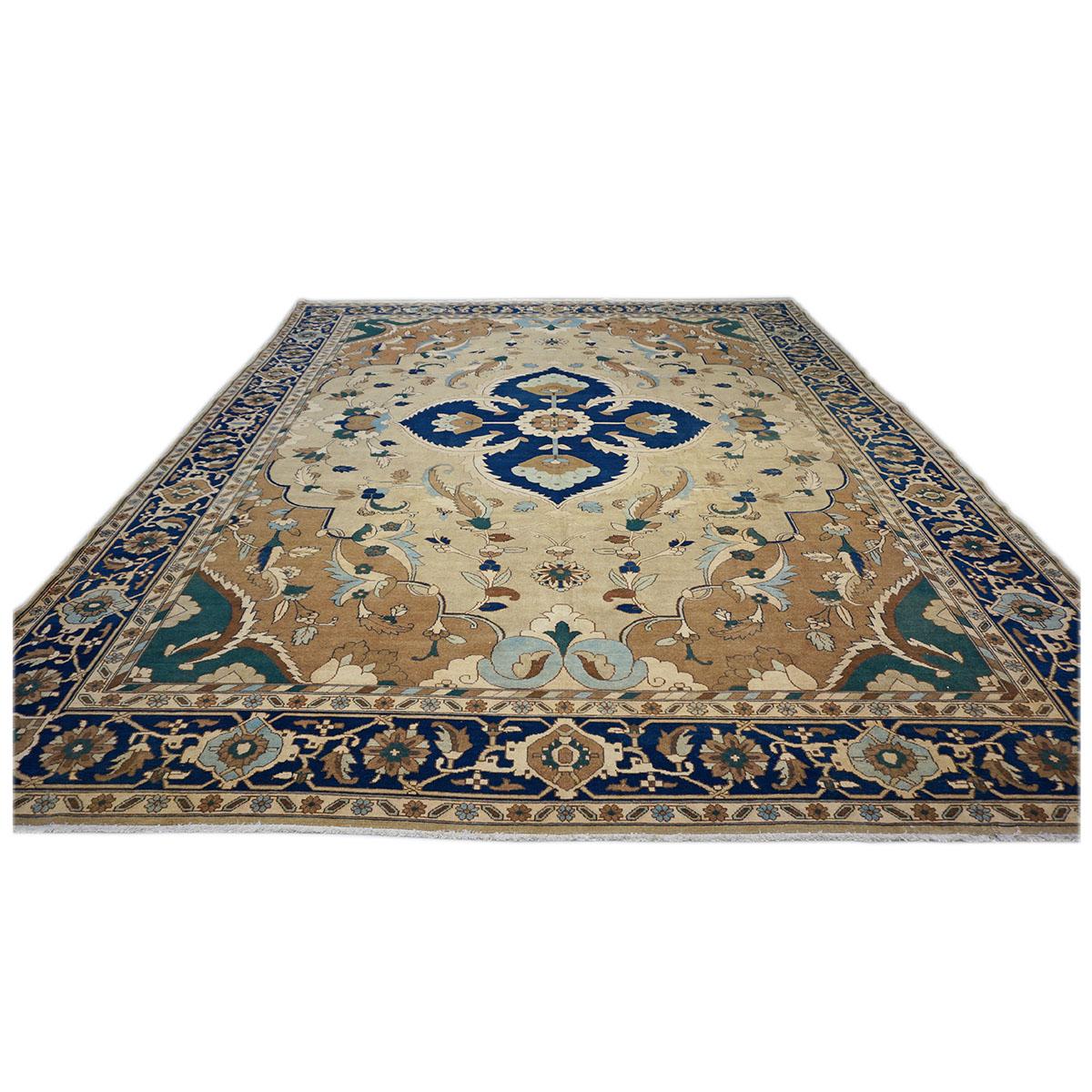 Ashly Fine Rugs presents a New Persian Heriz 12x15 Handmade Area Rug. Heriz rugs are well-known for their bold geometric patterns and vibrant colors, often featuring shades of red, blue, and ivory. These rugs typically showcase a central medallion