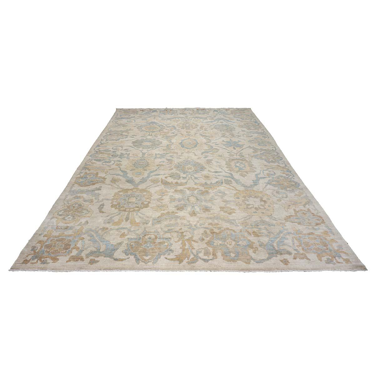 Ashly Fine Rugs presents an antique recreation of an original Persian Sultanabad 10x14 Ivory, Tan, & Blue Handmade Area Rug. Part of our own previous production, this antique recreation was thought of and created in-house and 100% handmade in Iran