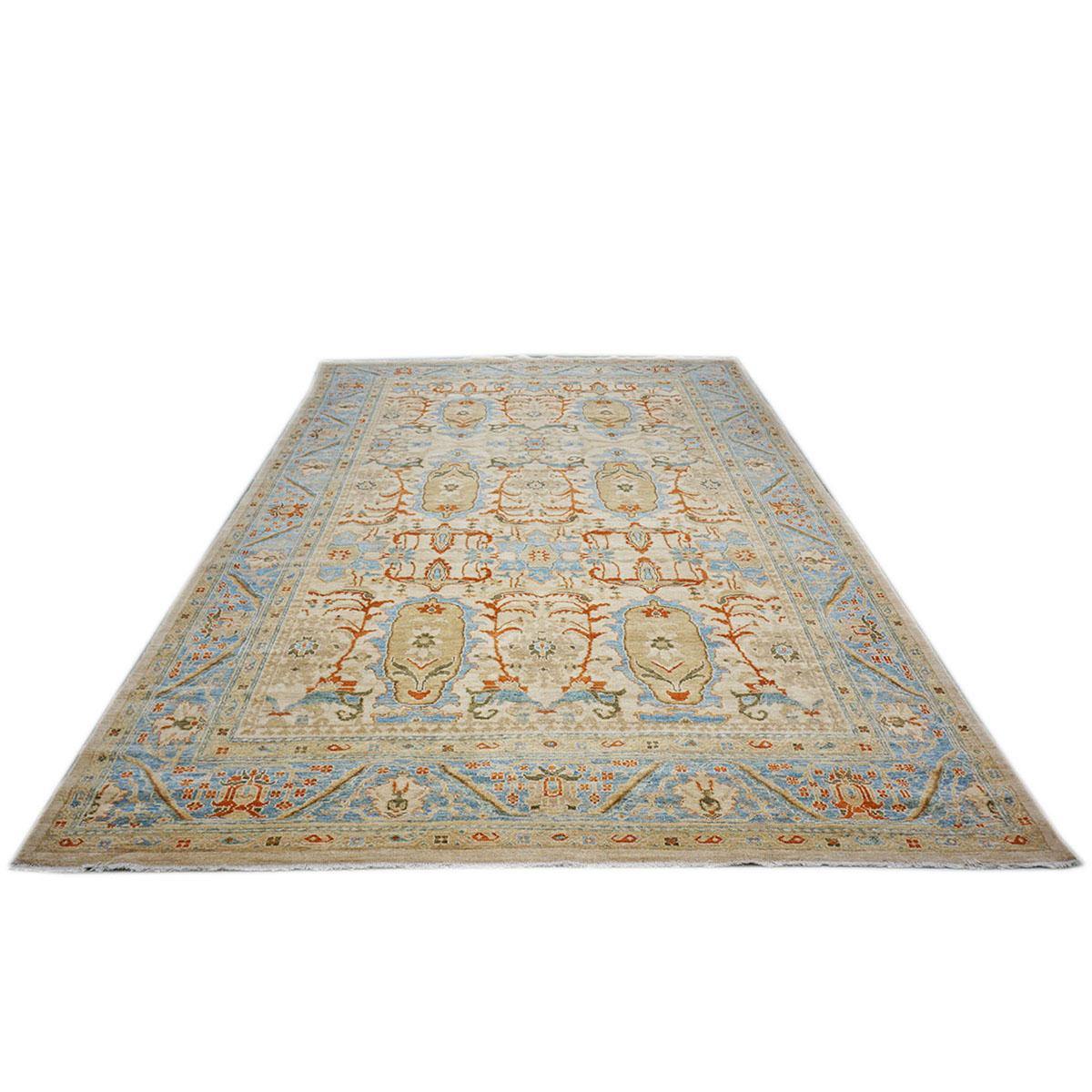 Ashly Fine Rugs presents an antique recreation of an original Persian Sultanabad room-sized area rug. Part of our own previous production, this antique recreation was thought of and created in-house and handmade in Persia by our master weavers. This