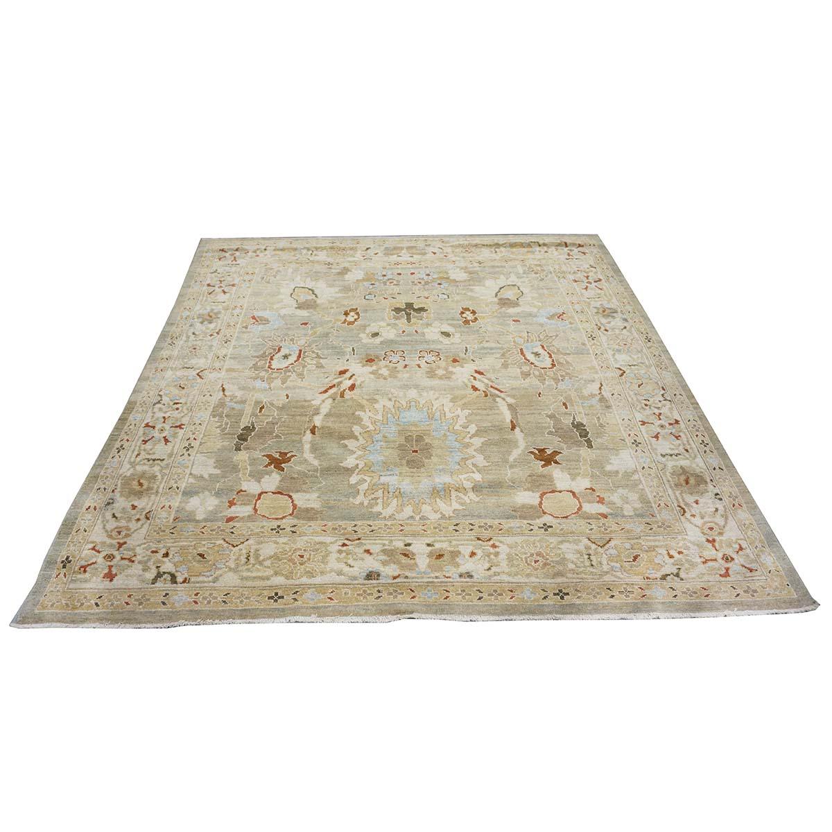 Ashly Fine Rugs presents an antique recreation of an original Persian Sultanabad 8x8 Square Tan, Blue, & Ivory Handmade Area Rug. Part of our own previous production, this antique recreation was thought of and created in-house and 100% handmade in