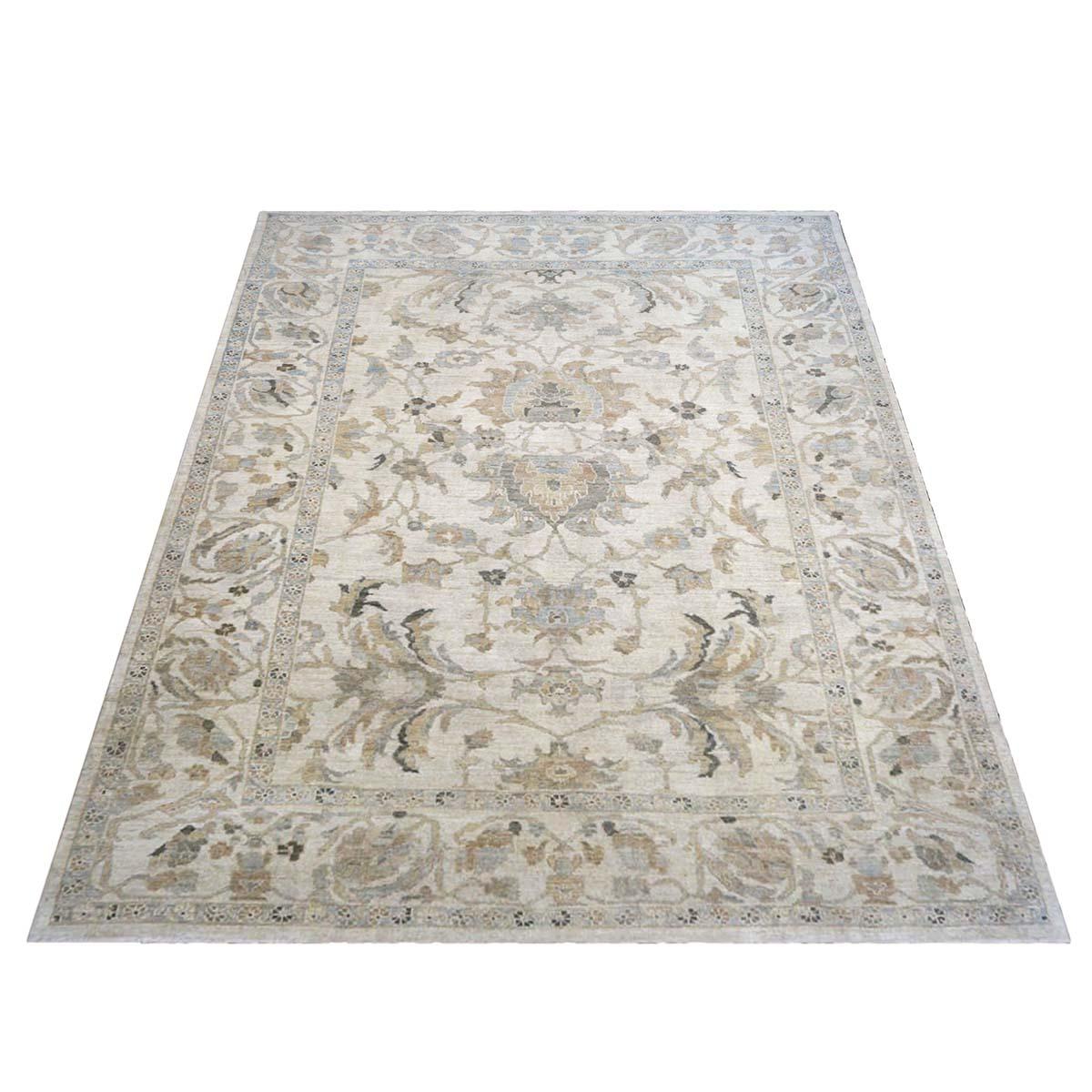Ashly Fine rugs presents an antique recreation of an original Persian Sultanabad 9x11 Ivory, Light Blue, & Tan Handmade Area Rug. Part of our own previous production, this antique recreation was thought of and created in-house and 100% handmade in