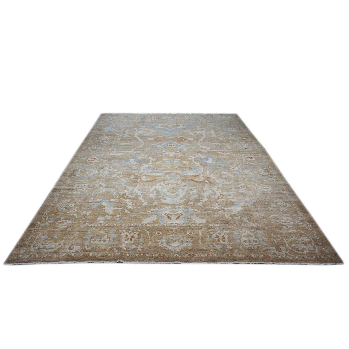 Ashly Fine Rugs presents an antique recreation of an original Persian Sultanabad room-sized area rug. Part of our own previous production, this antique recreation was thought of and created in-house and handmade in Persia by our master weavers. This