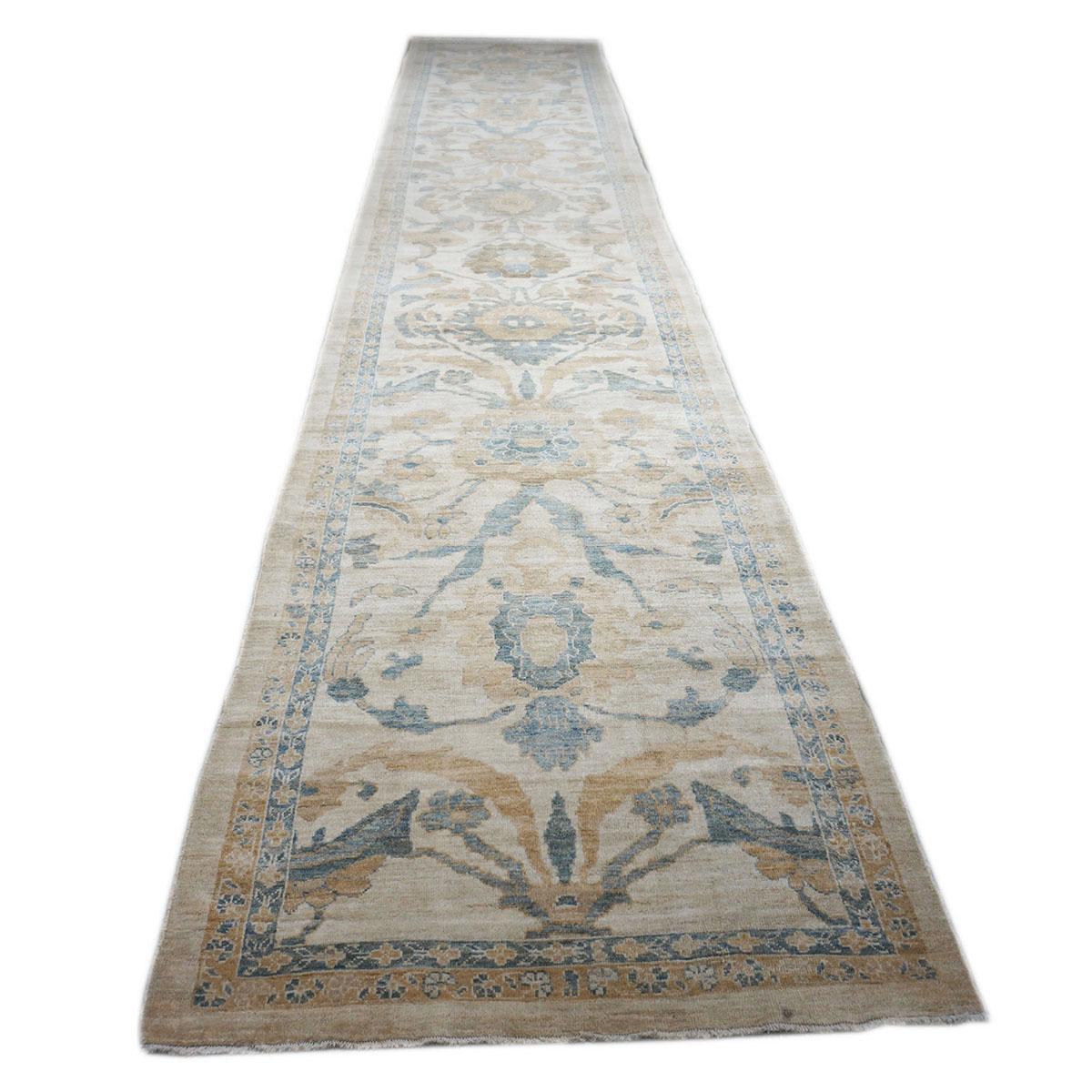 Ashly Fine Rugs presents an antique recreation of an original Persian Sultanabad hallway runner rug. Part of our own previous production, this antique recreation was thought of and created in-house and handmade in Persia by our master weavers. This