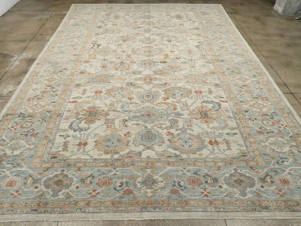 A modern Persian Sultanabad large room size carpet handmade during the 21st century.

Measures: 12' 8
