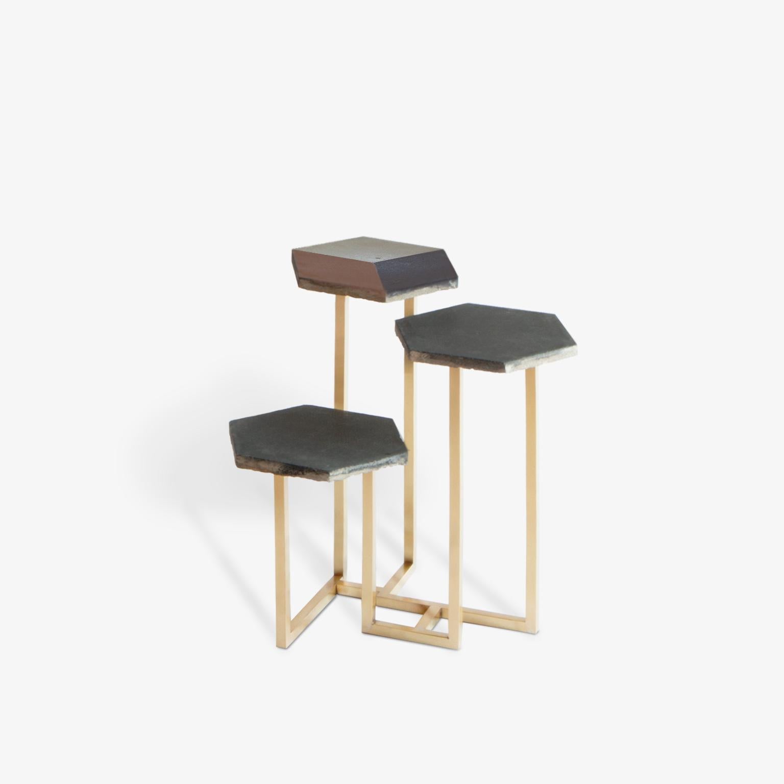 This modular tables are made with hexagonal flooring tiles from aristocratic Milanese residence and base in opaque brass. All the pieces are handmade by small-scale fabricators and show a dedication to both experimentation and the honesty and