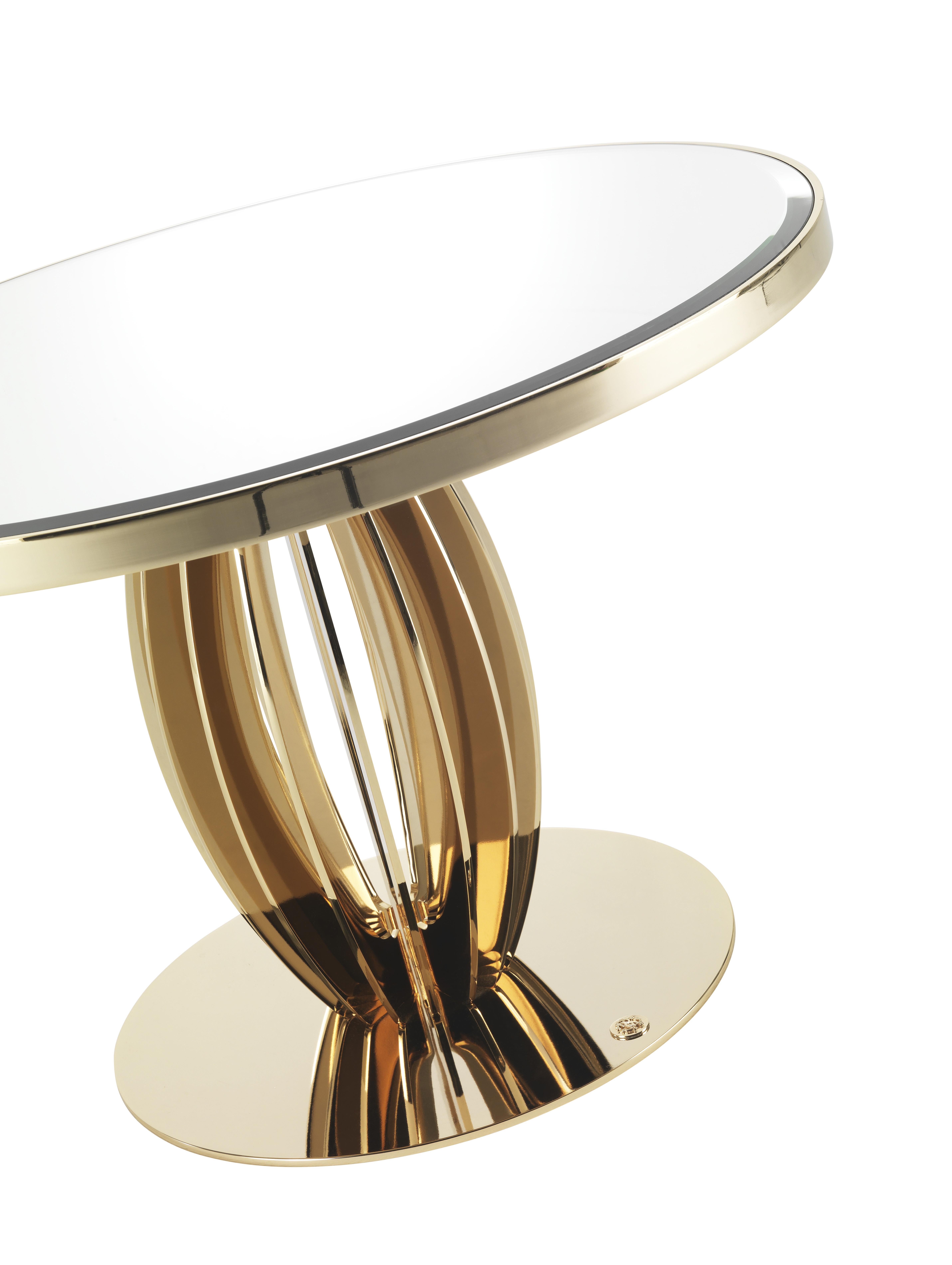 Pumpkin Side table structure in gold metal finishing. Top with bevelled natural mirror.
 