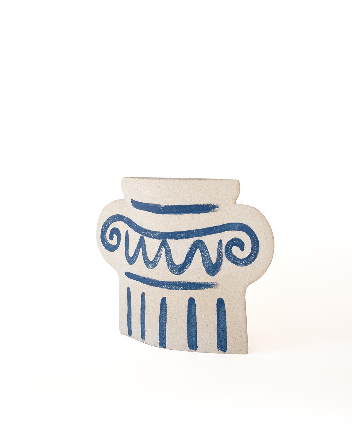 A part of a captivating new line blending ancient Greek pottery with contemporary design, the ‘Greek Column’ vase showcases delicate blue underglaze illustrations that harmonize traditional and modern aesthetics.
Crafted by our designer, the blue