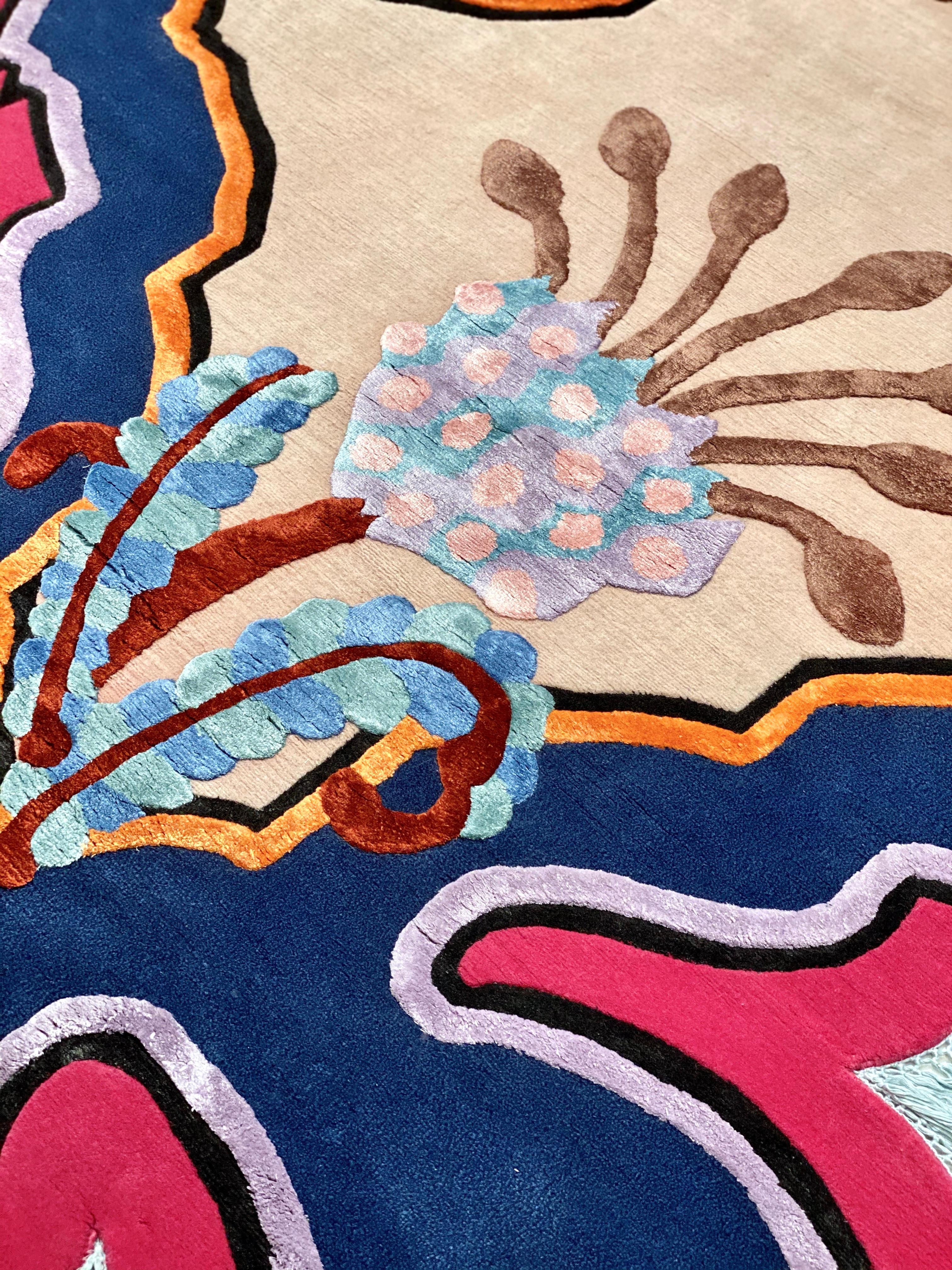  It’s a playful hand-knotted rug made with Himalayan wool and natural silk, inspired by flora and organic shapes with vibrant colors and stylistic geometries that reflect artist’s eclectic vision and her personal take on interior design.

This rug