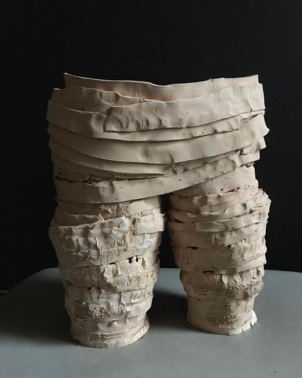 Handmade organic shape stoneware sculpture by Jennefer Hoffmann

Hoffmann's intuitive and emotional study practice produces sculptural forms that
they are open objects for contemplation. Forms are a means to explore the
world around us, whether